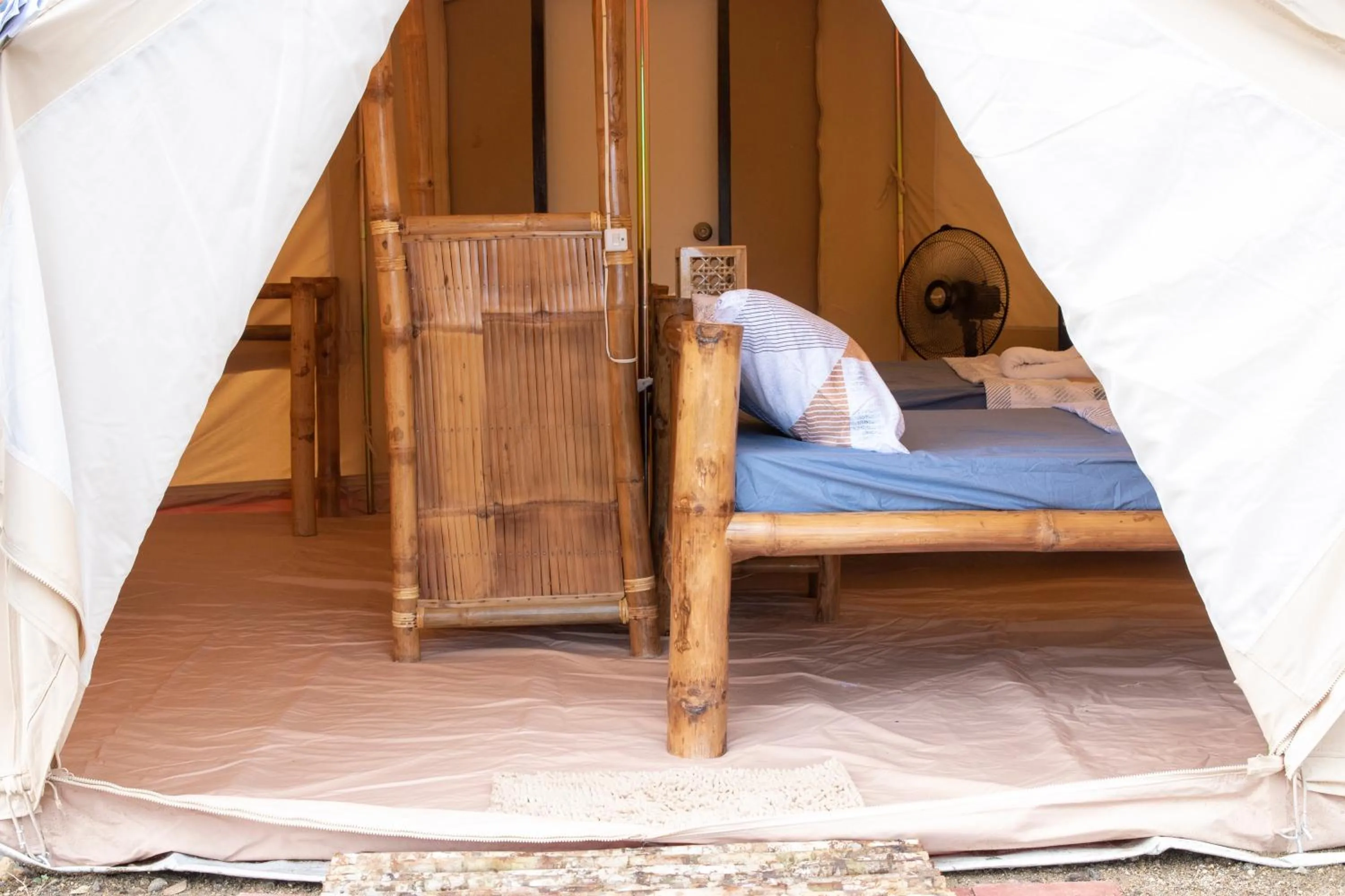 Bed in The Acacia Glamping Park