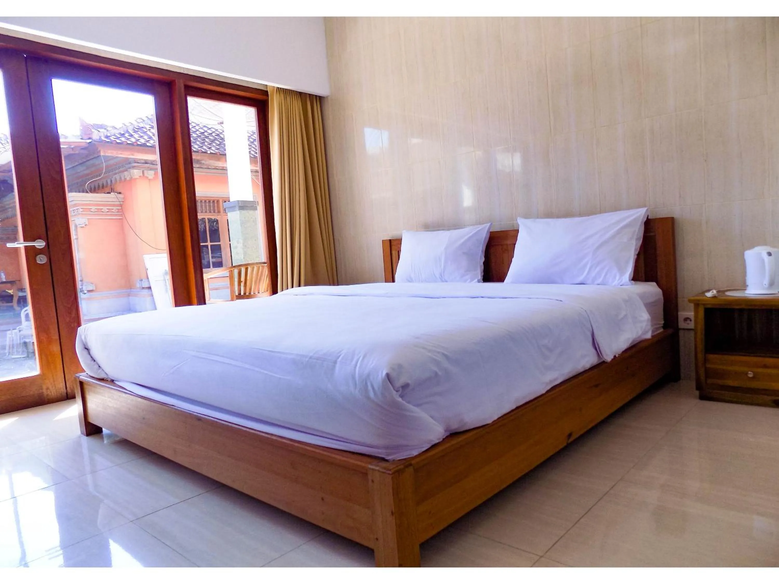 Bedroom, Bed in Guna Graha Kuta by Kamara