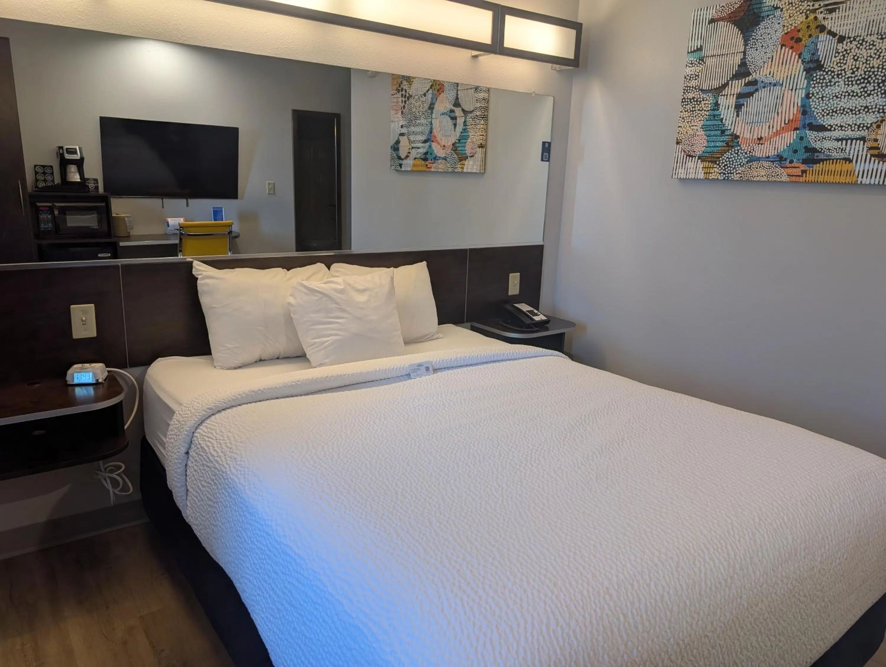 Bed in Microtel Inn & Suites by Wyndham Wheeling at The Highlands