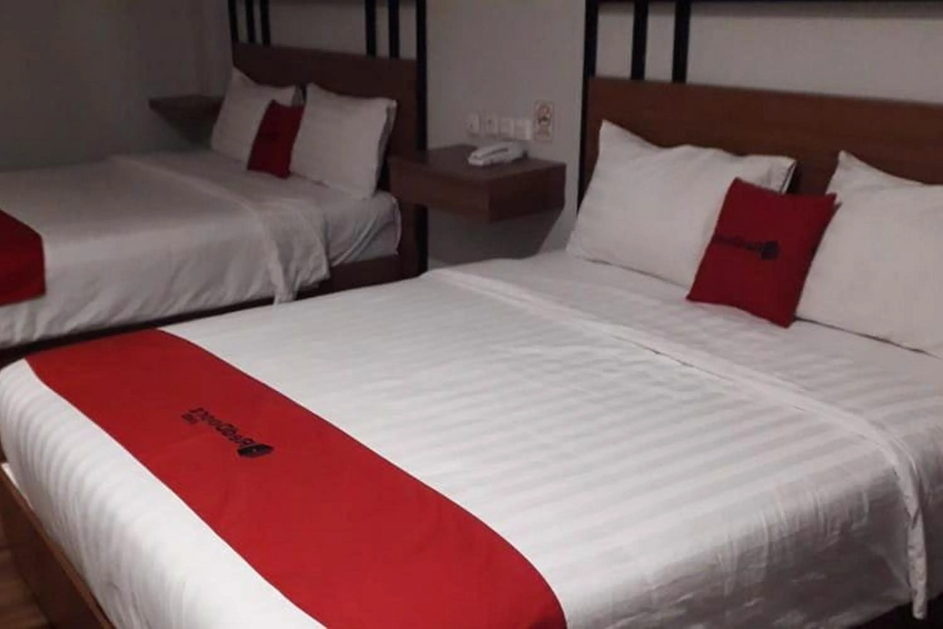 Bed in RedDoorz Plus @ Doorman Guest House