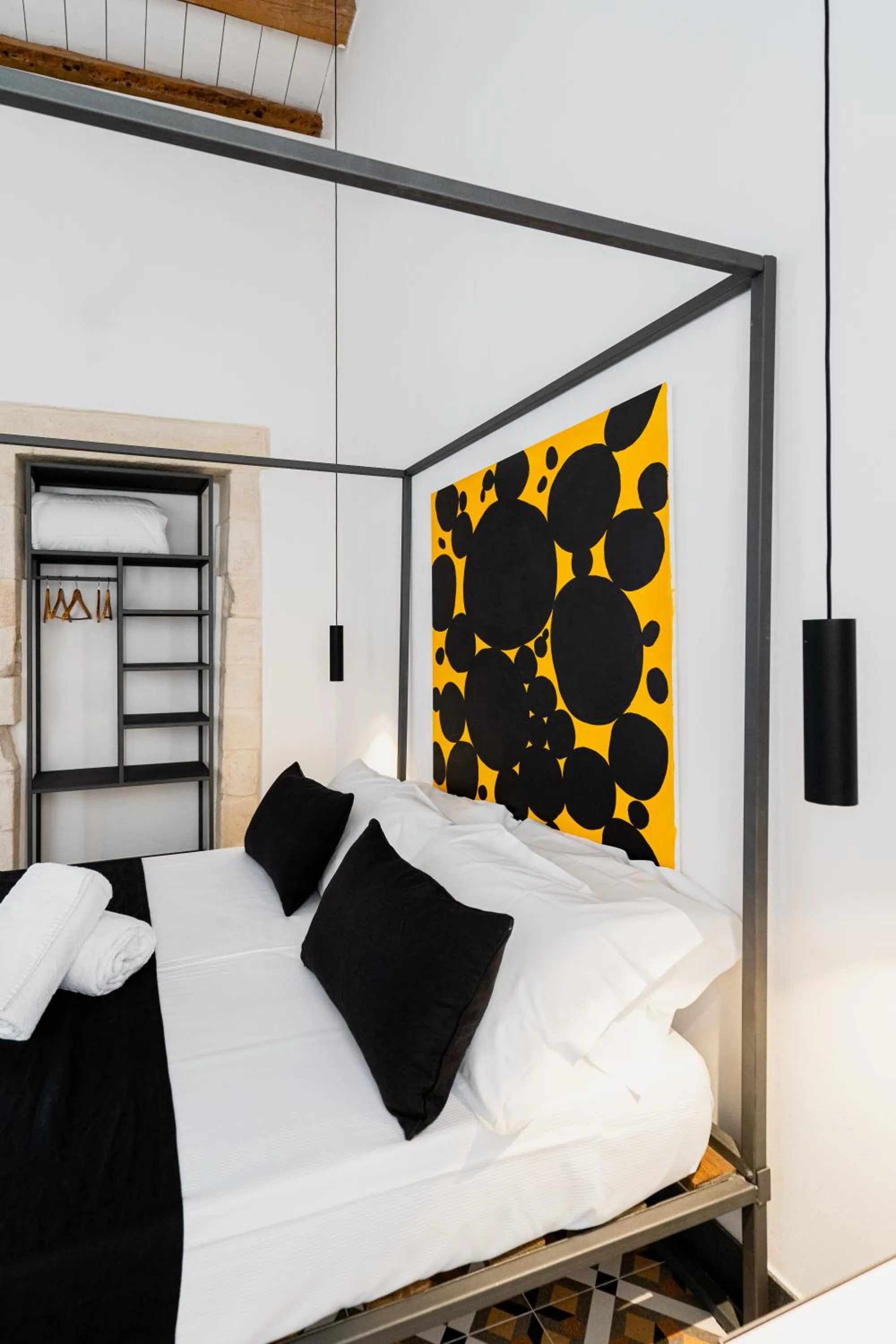 Bed in Isabella di Castiglia Apartments