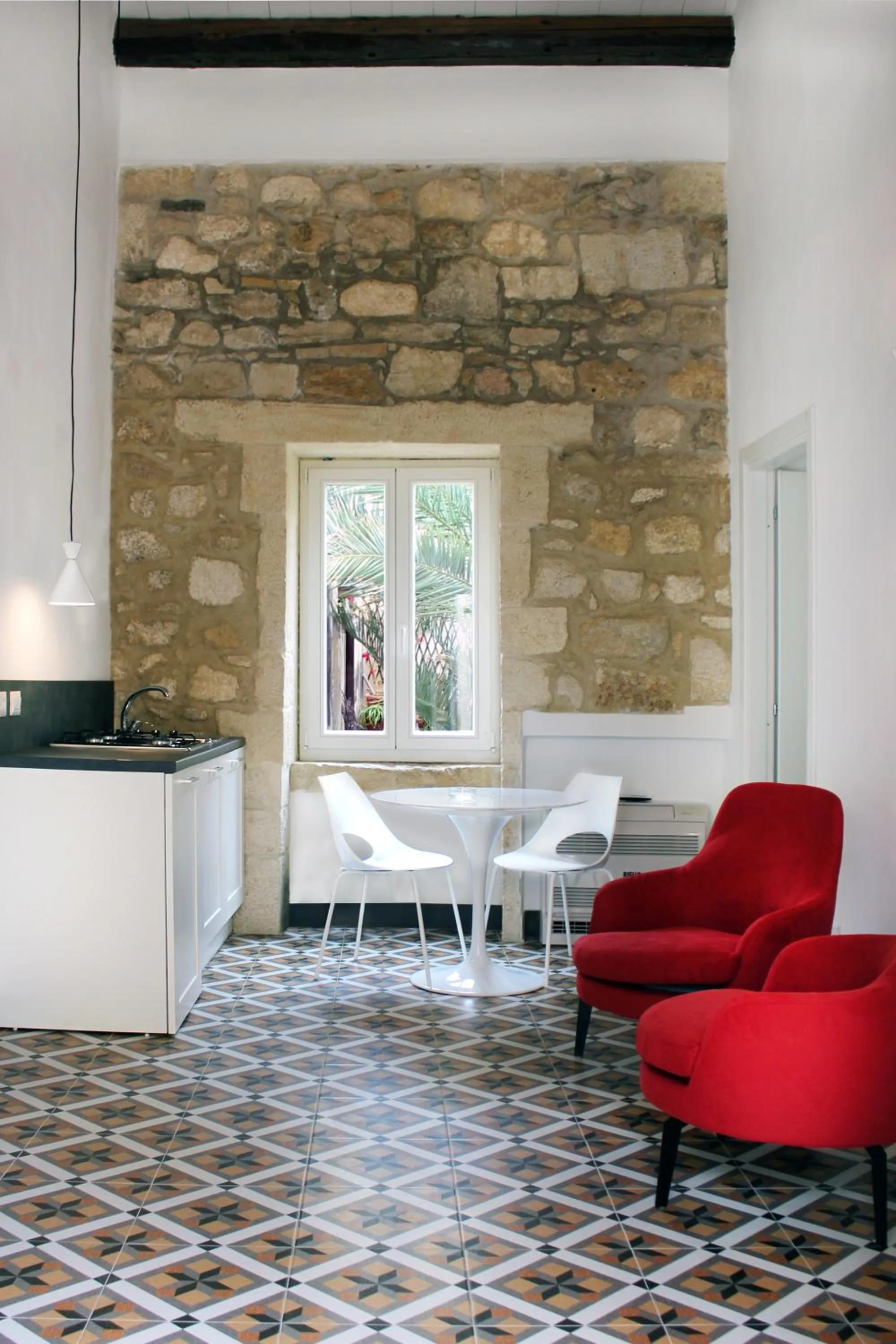 Seating area in Isabella di Castiglia Apartments