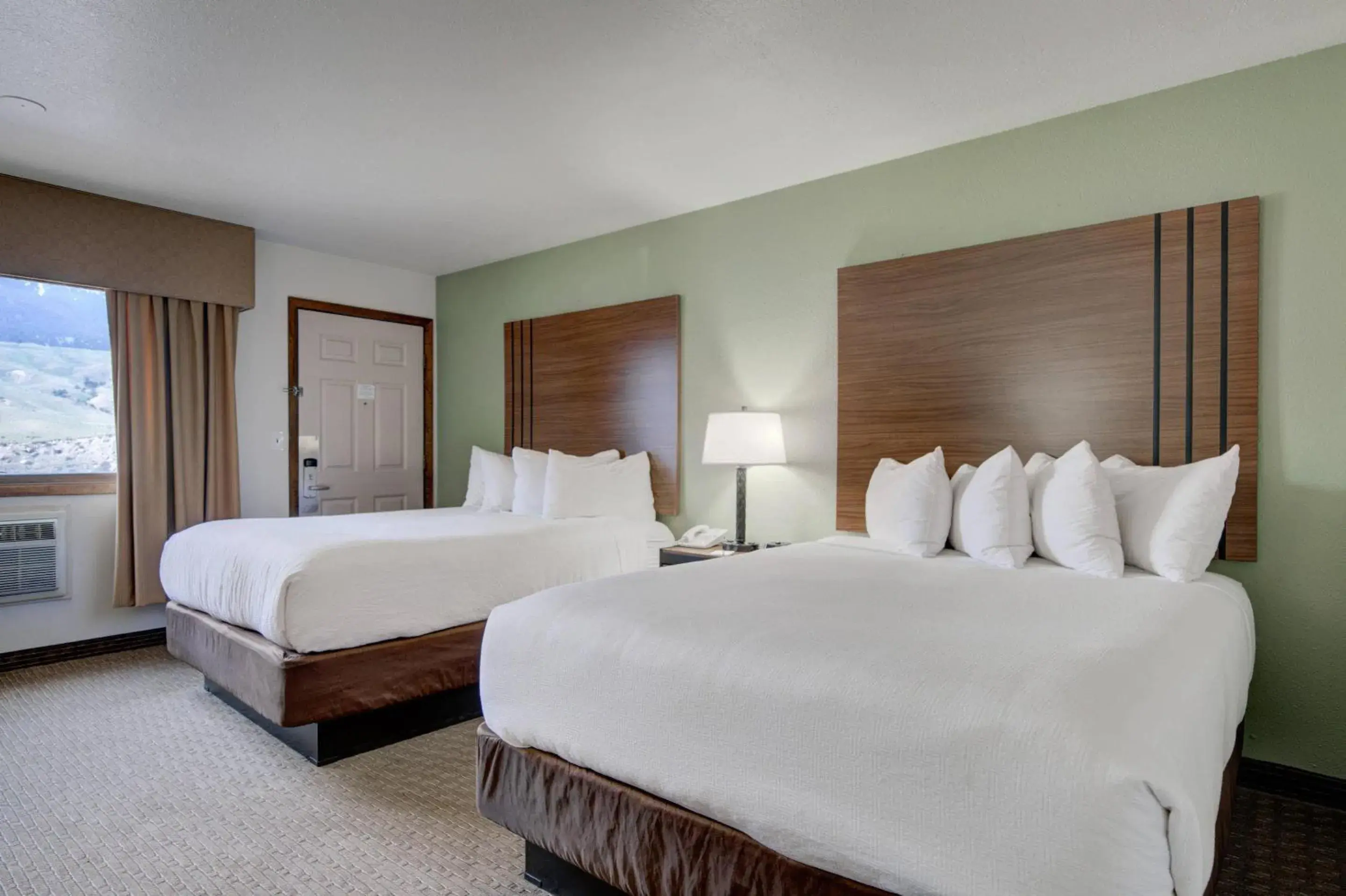 Queen Room with Two Queen Beds and Mountain View - Non-Smoking in Ridgeline Hotel at Yellowstone, an Ascend Collection Hotel Queen Room with Two Queen Beds and Mountain View - Non-Smoking in Ridgeline Hotel at Yellowstone, an Ascend Collection Hotel