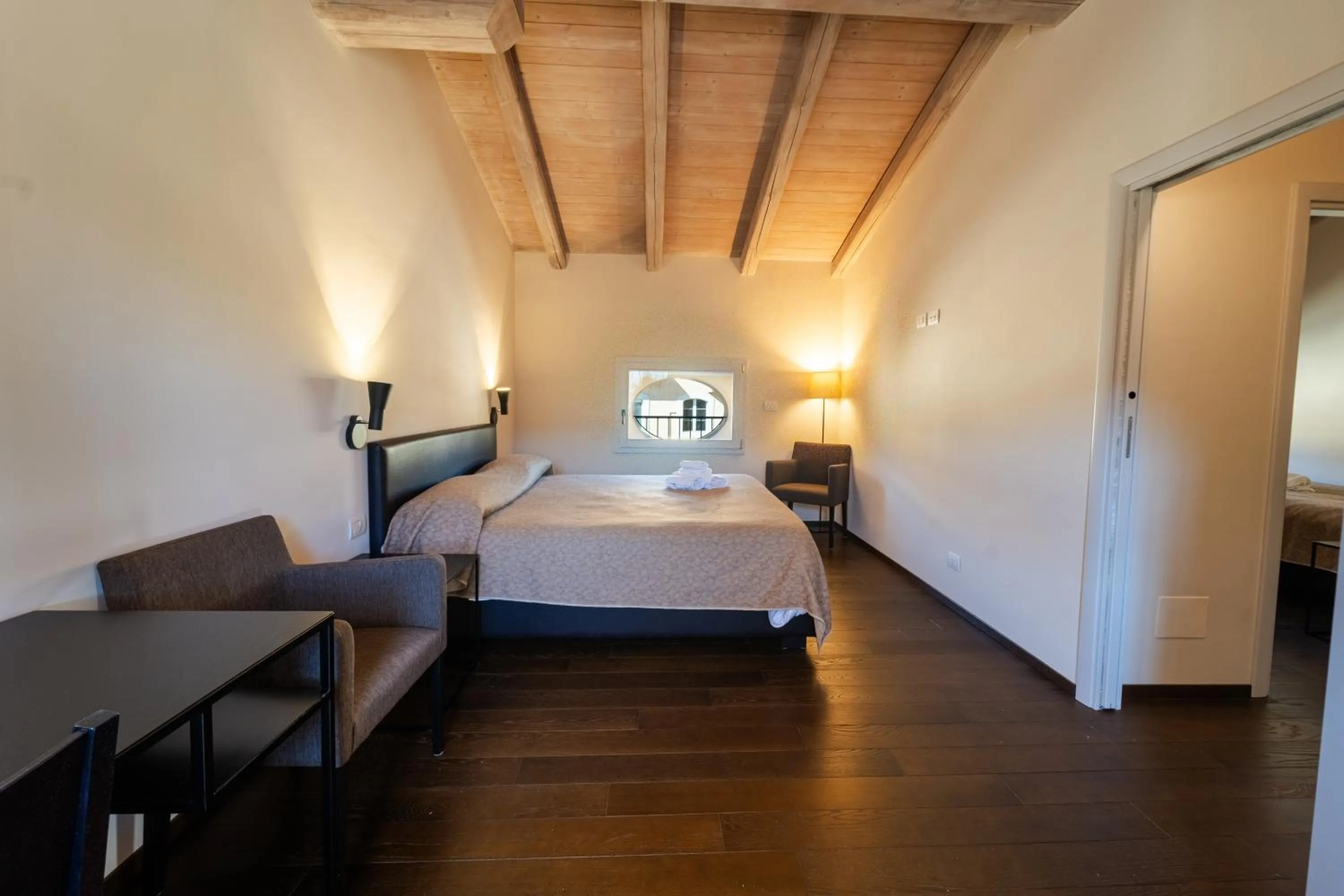 Bed in PALAZZO DE' ROSSI HOTEL