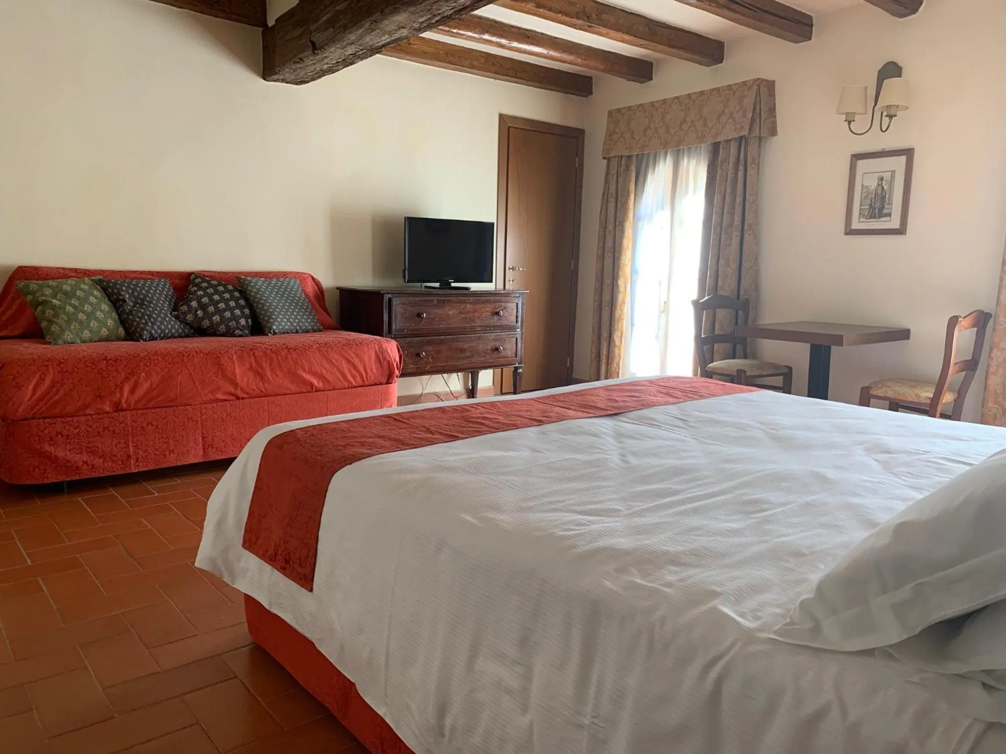 Bed in PALAZZO DE' ROSSI HOTEL