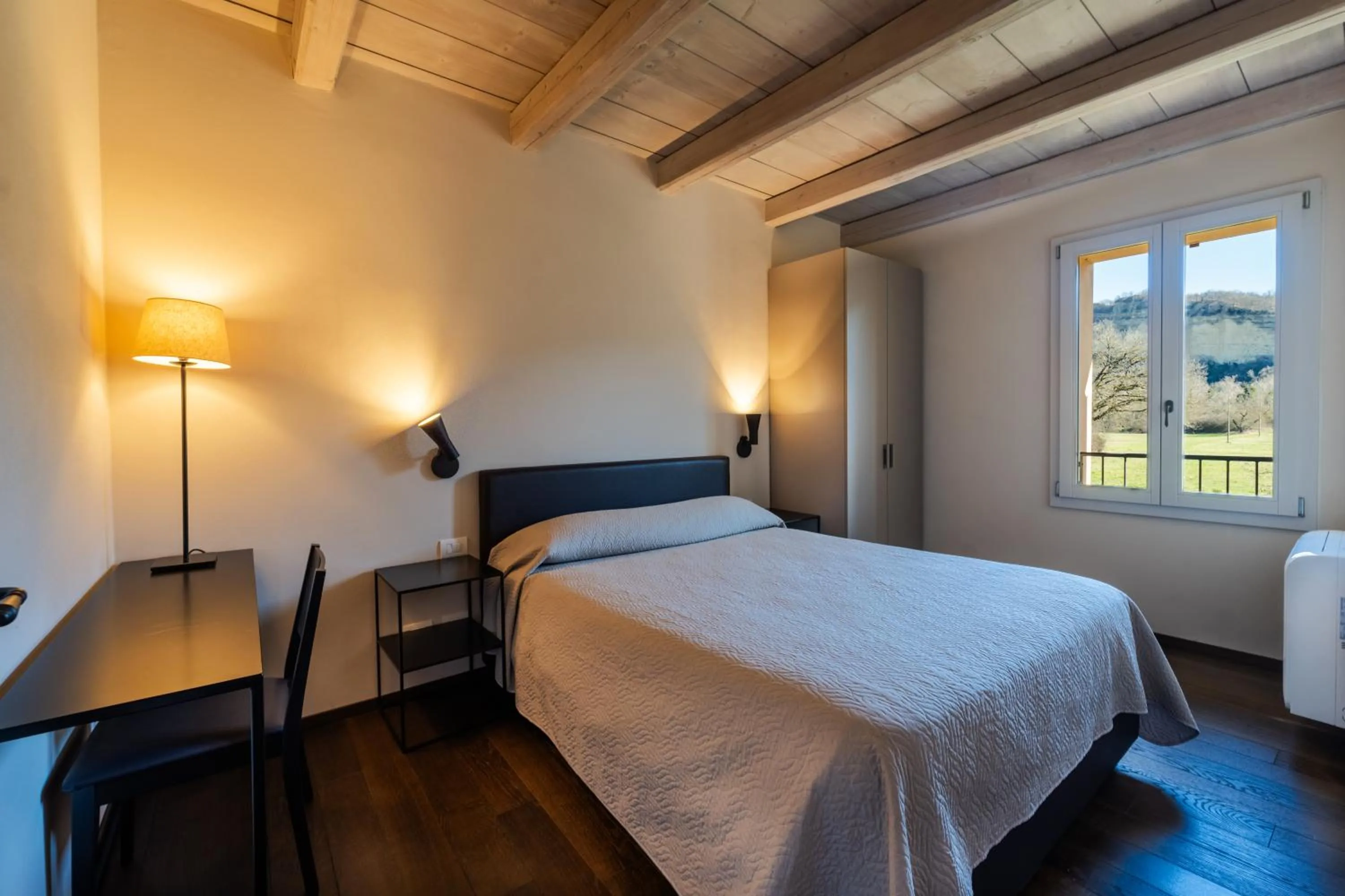 Bed in PALAZZO DE' ROSSI HOTEL