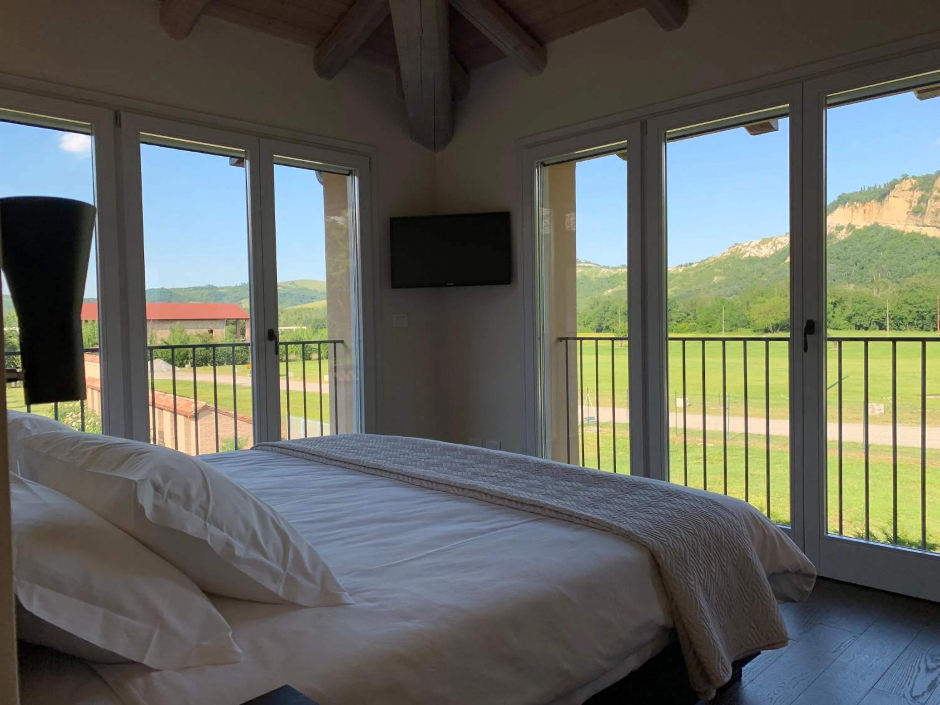 Bed in PALAZZO DE' ROSSI HOTEL