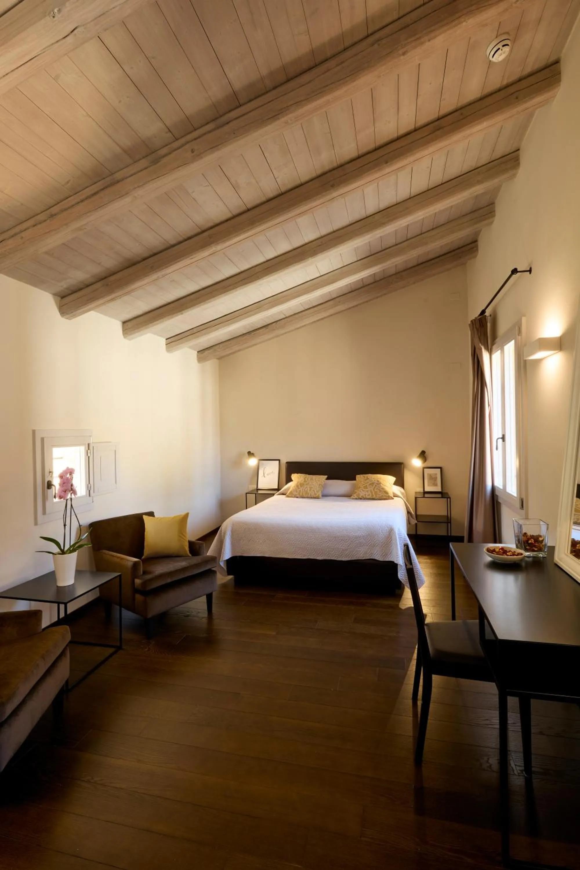 Bed in PALAZZO DE' ROSSI HOTEL