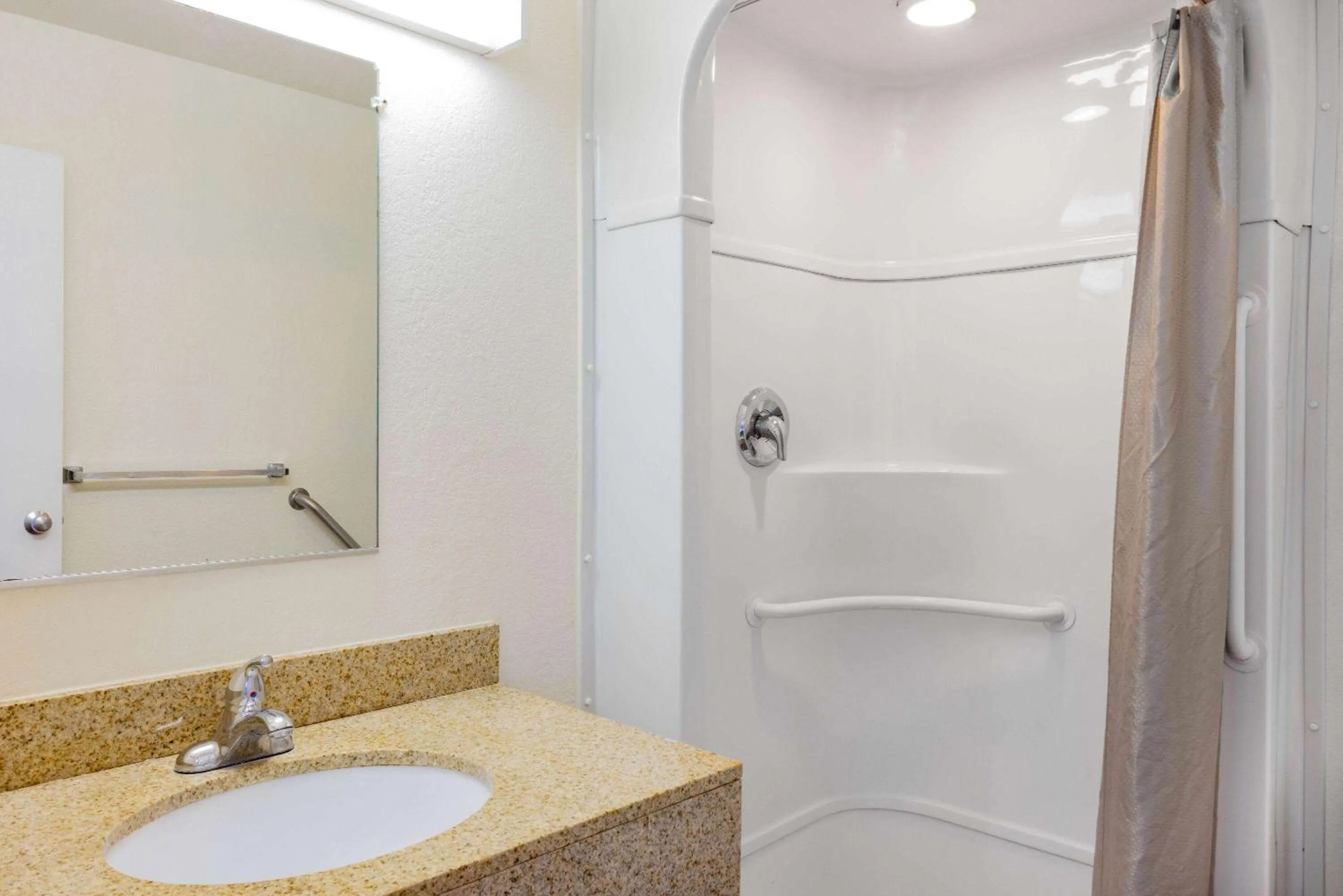 Bathroom in Travelodge by Wyndham Miles City