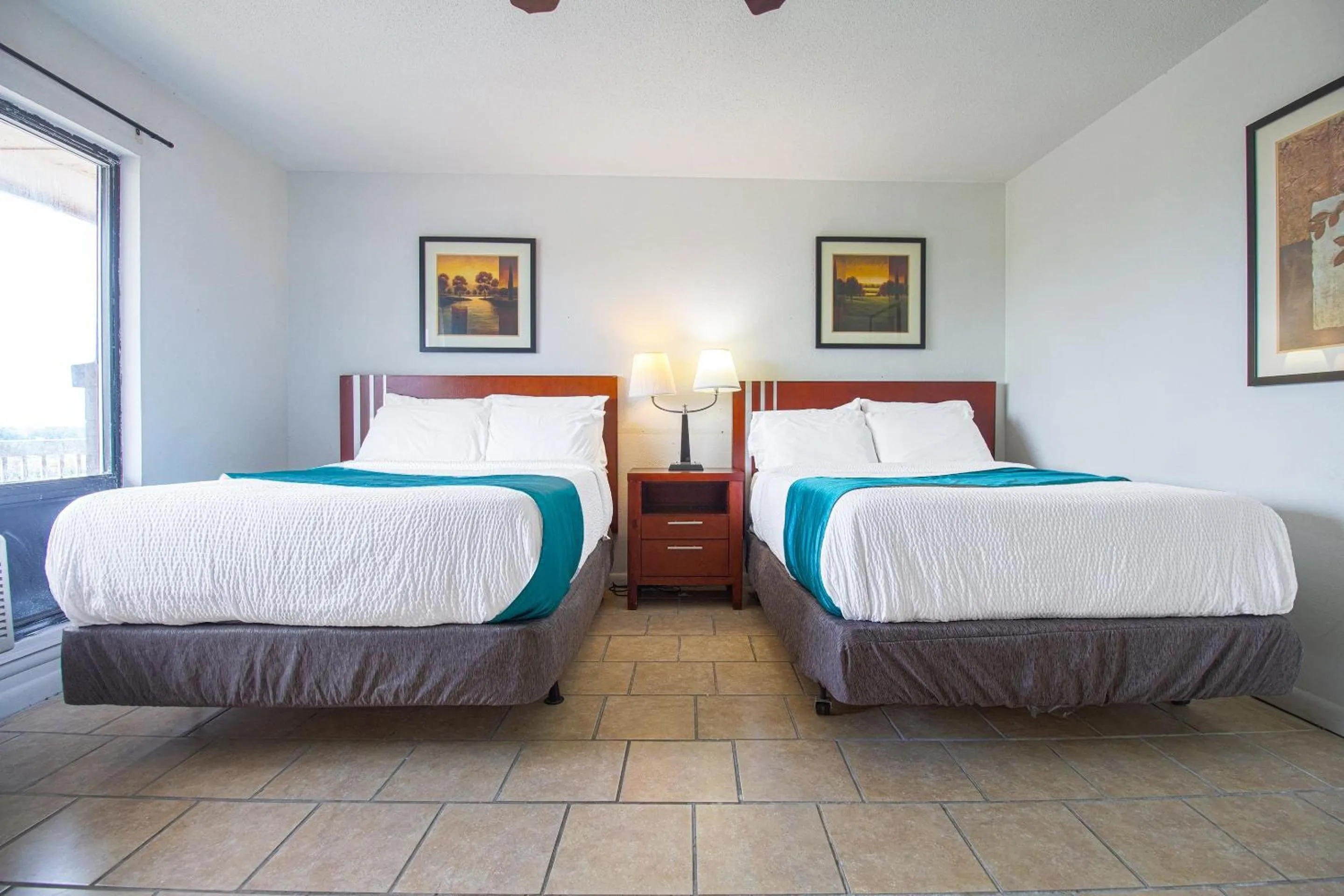 Bedroom in American Best Inn By OYO I-35 Perry near Lake McMurtry