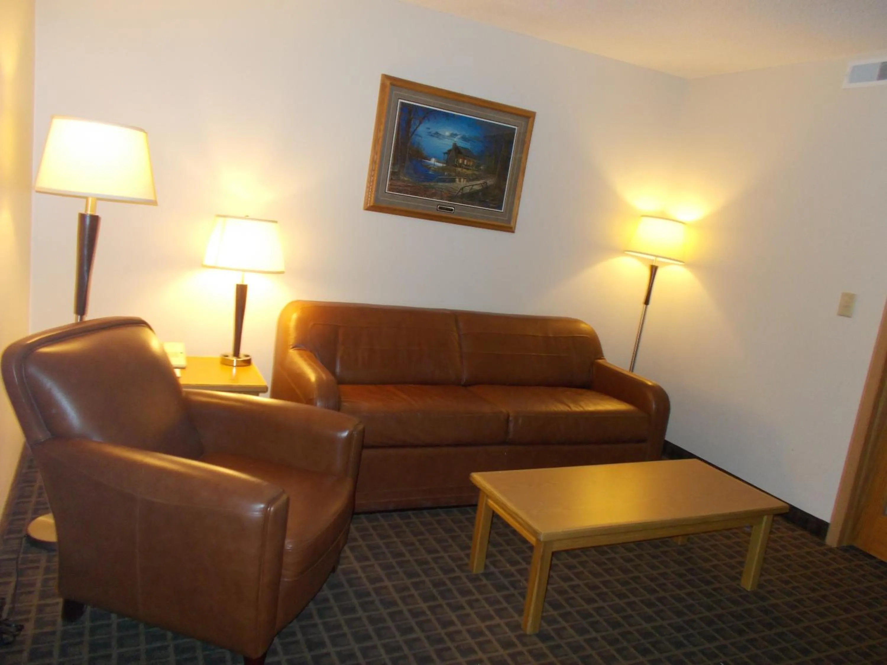 Seating area in AmericInn by Wyndham Aberdeen Event Center