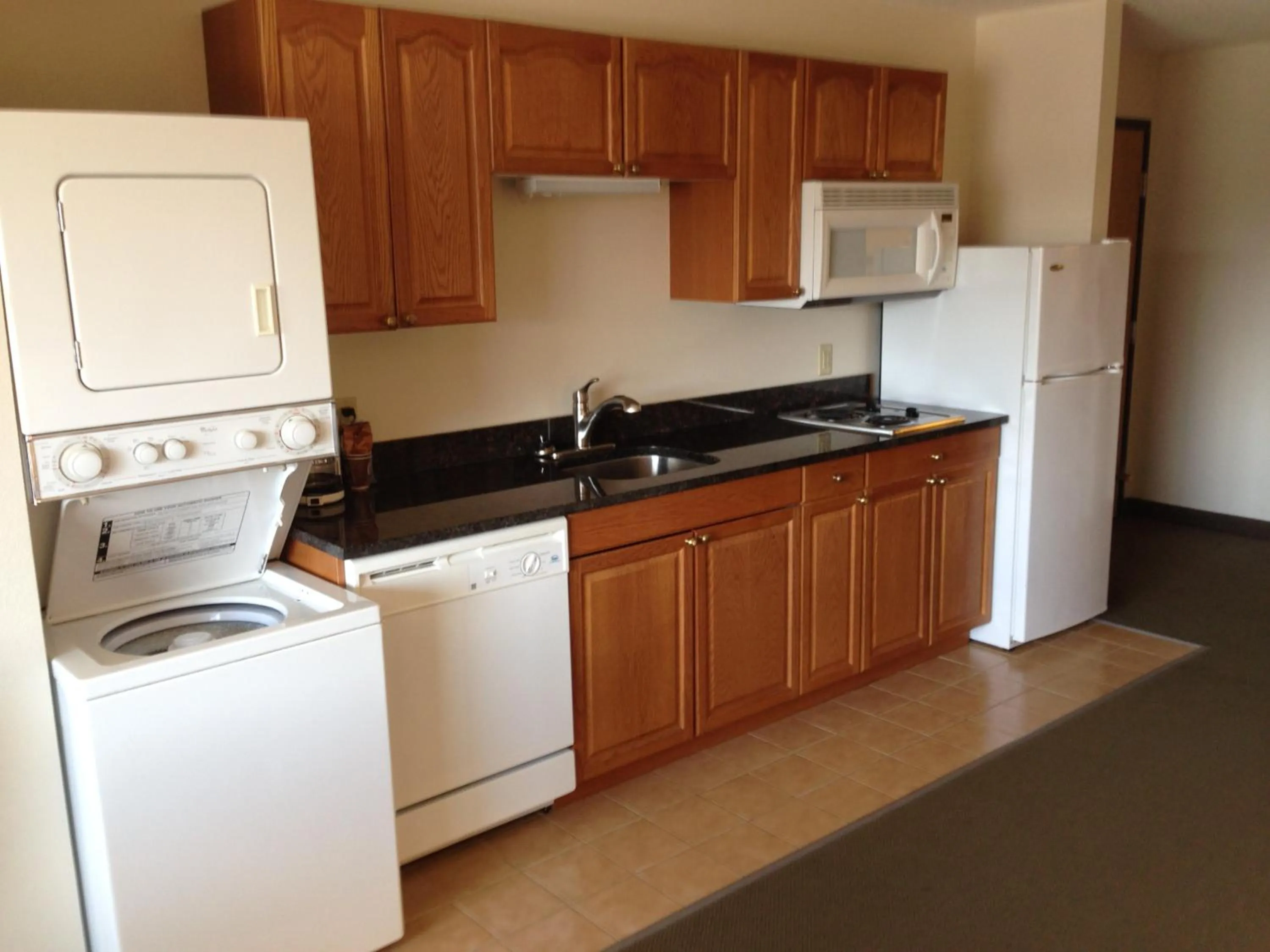 Kitchen or kitchenette in AmericInn by Wyndham Aberdeen Event Center