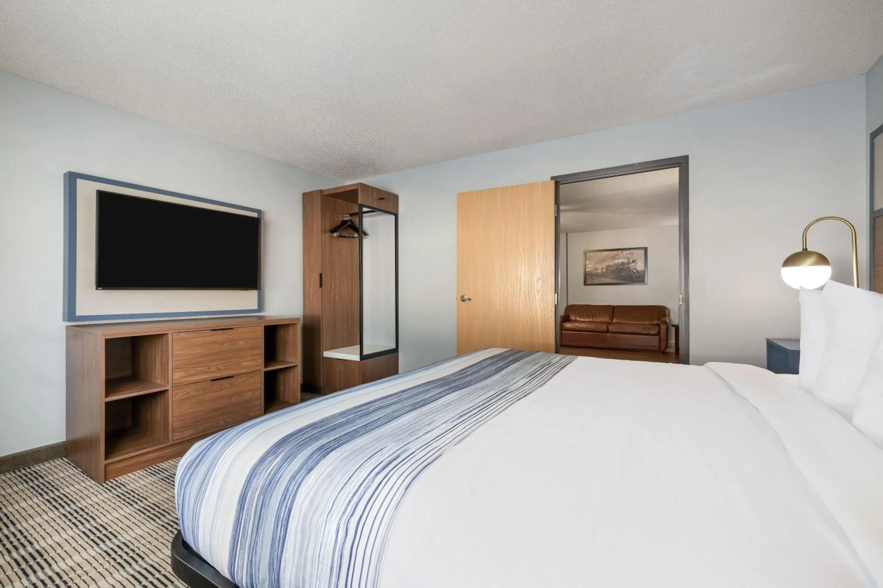Photo of the whole room, Bed in AmericInn by Wyndham Aberdeen Event Center