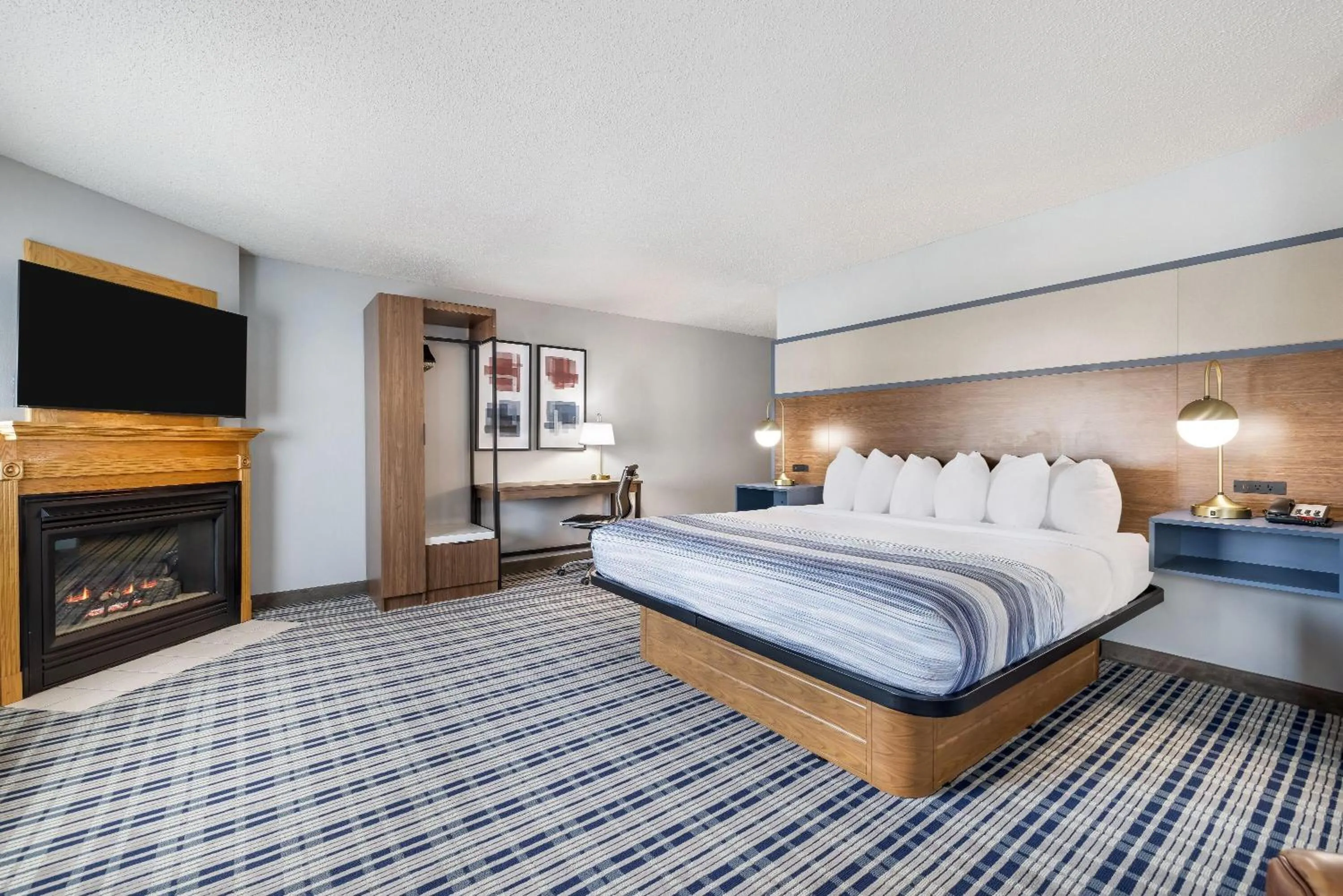 Photo of the whole room, Bed in AmericInn by Wyndham Aberdeen Event Center