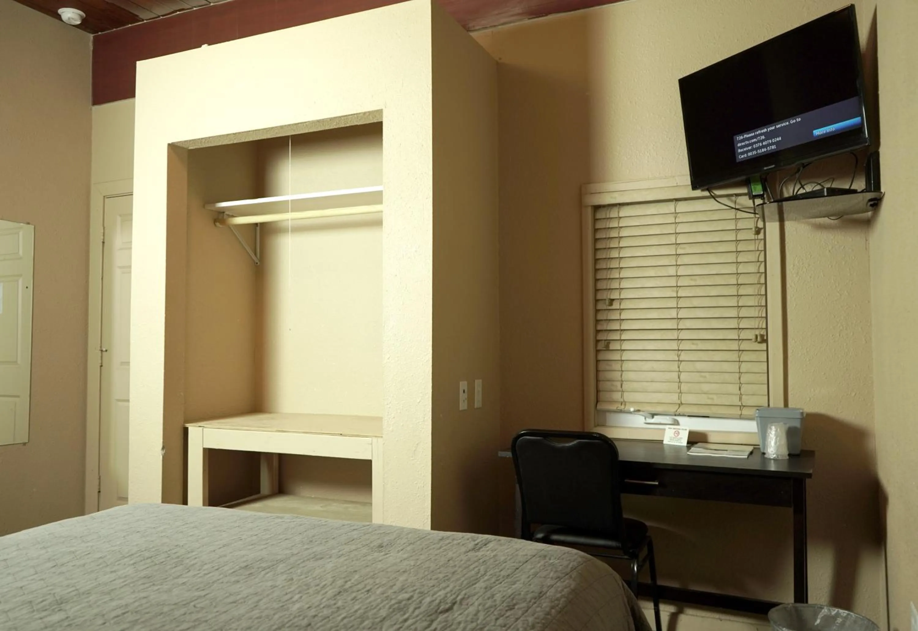 Bed in Old School Motel RV