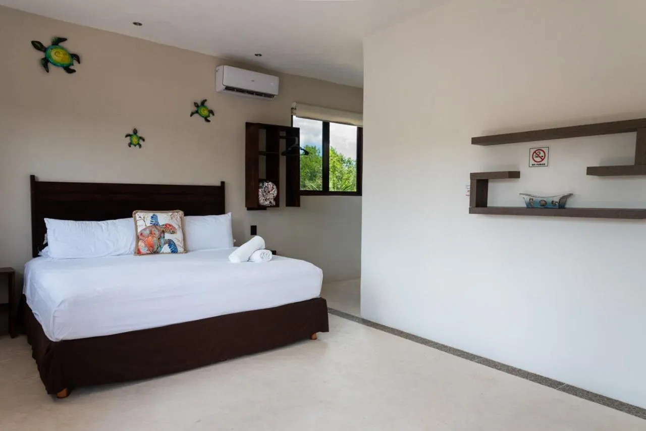 Bed in Villas Palmar Holbox