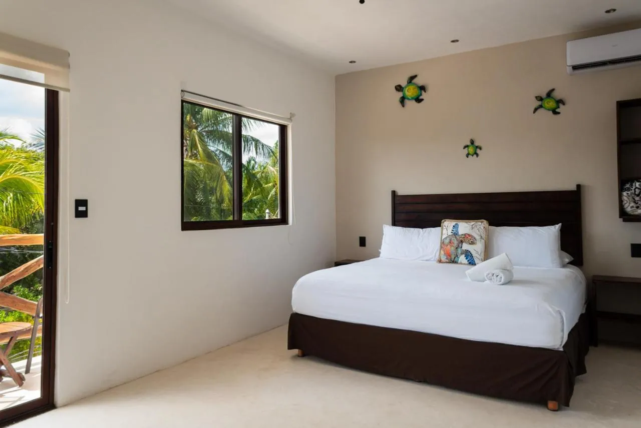 Bed in Villas Palmar Holbox