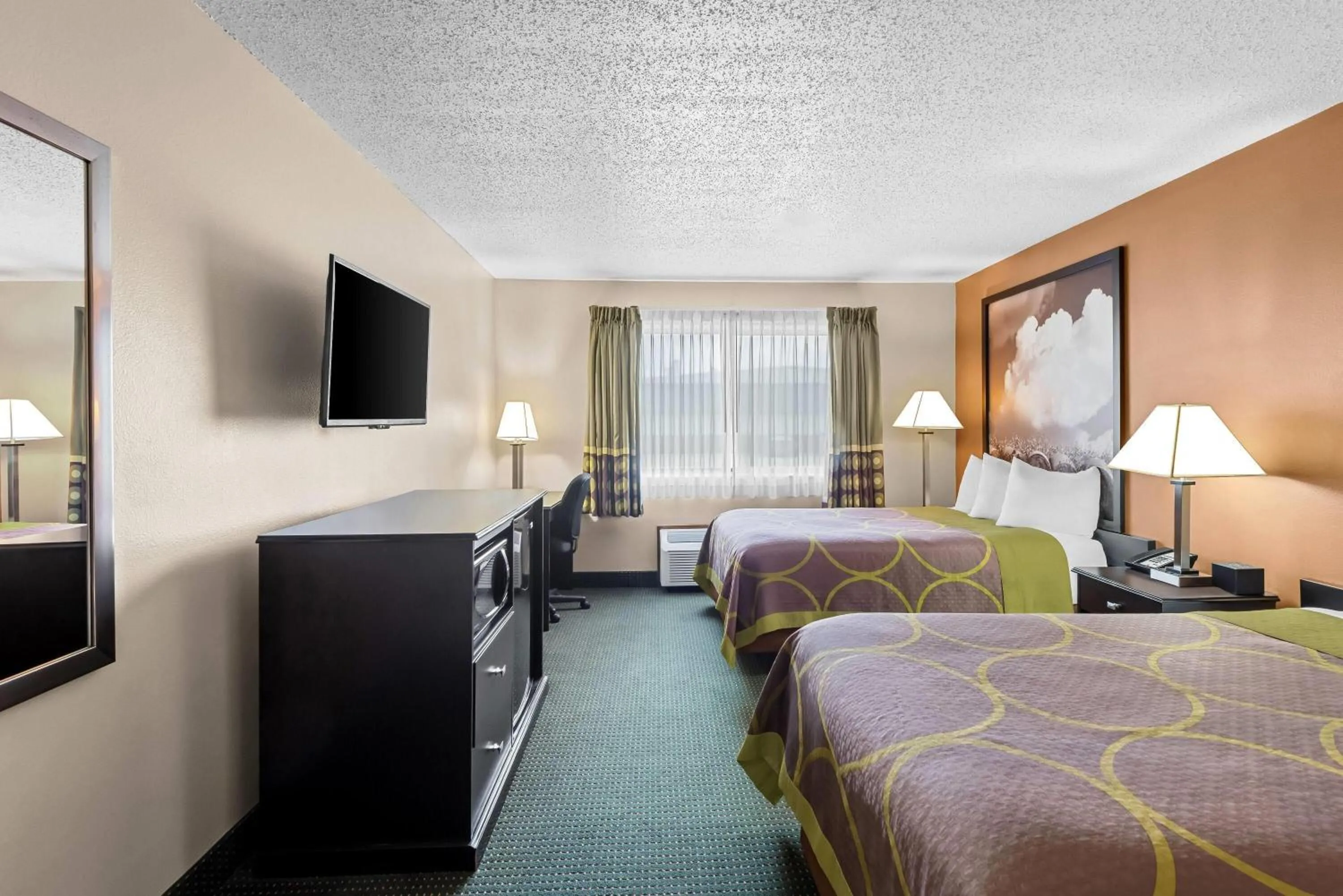 Bed in Super 8 by Wyndham Jefferson