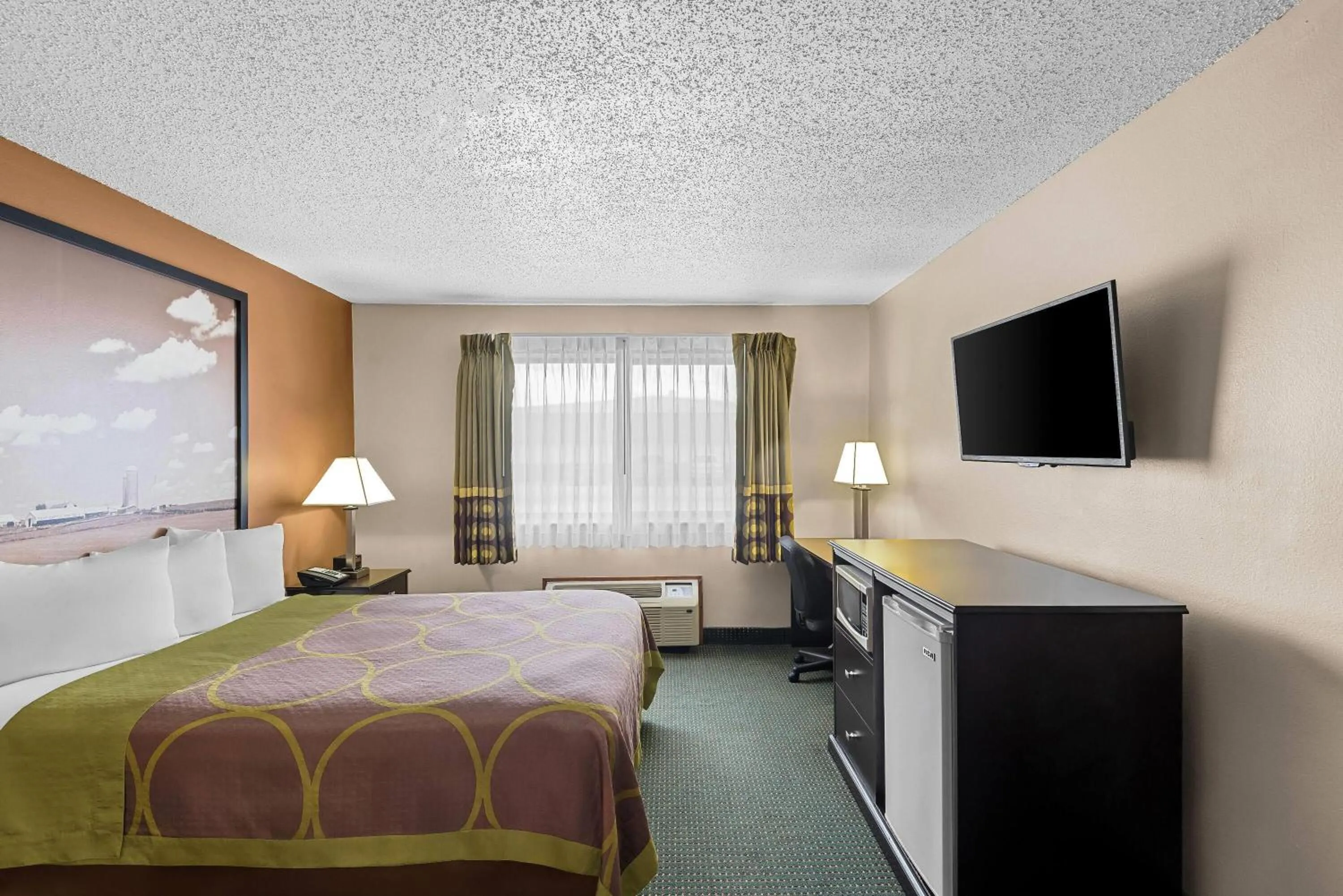 Bed in Super 8 by Wyndham Jefferson