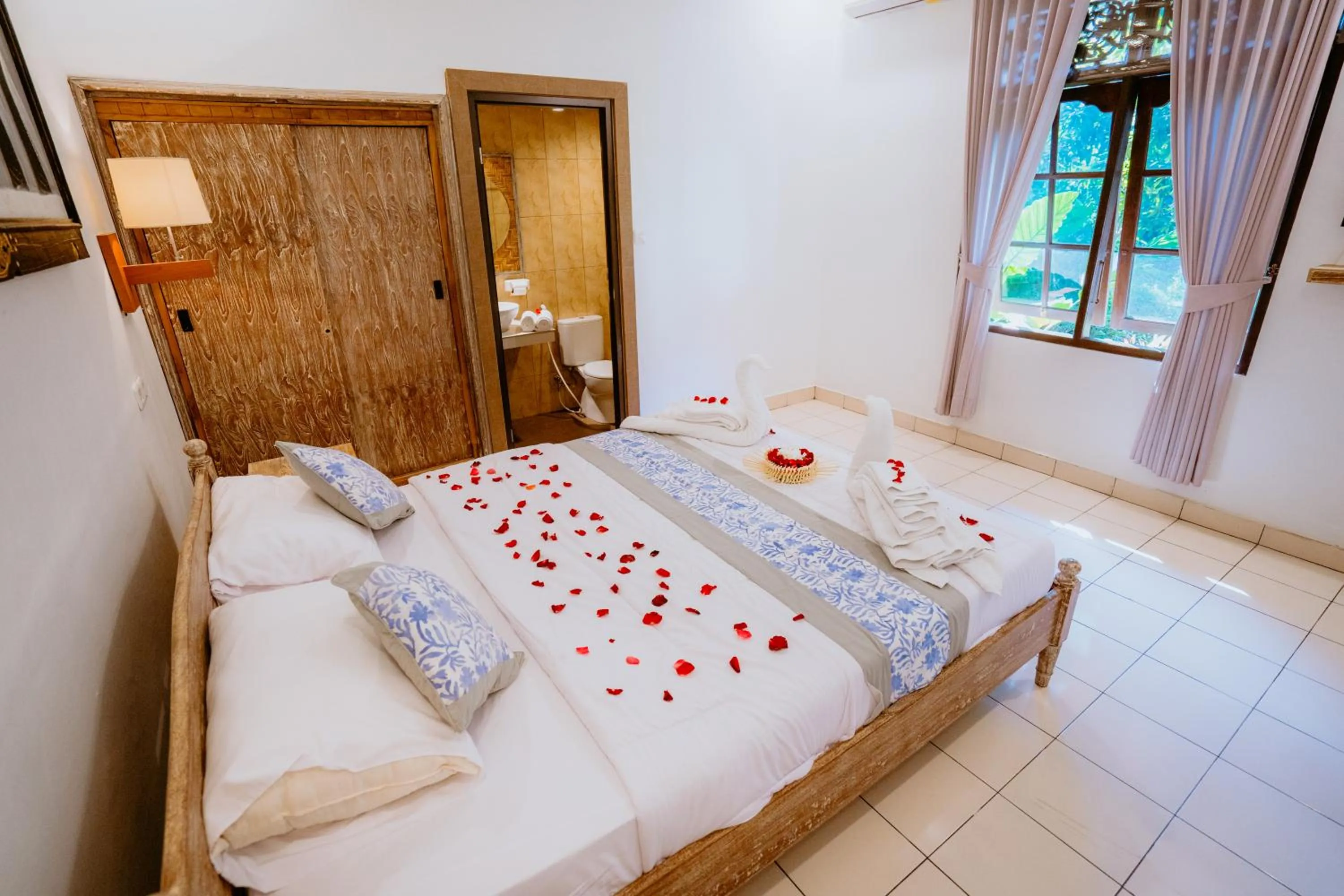 Bed in Rahayu Guest House Ubud