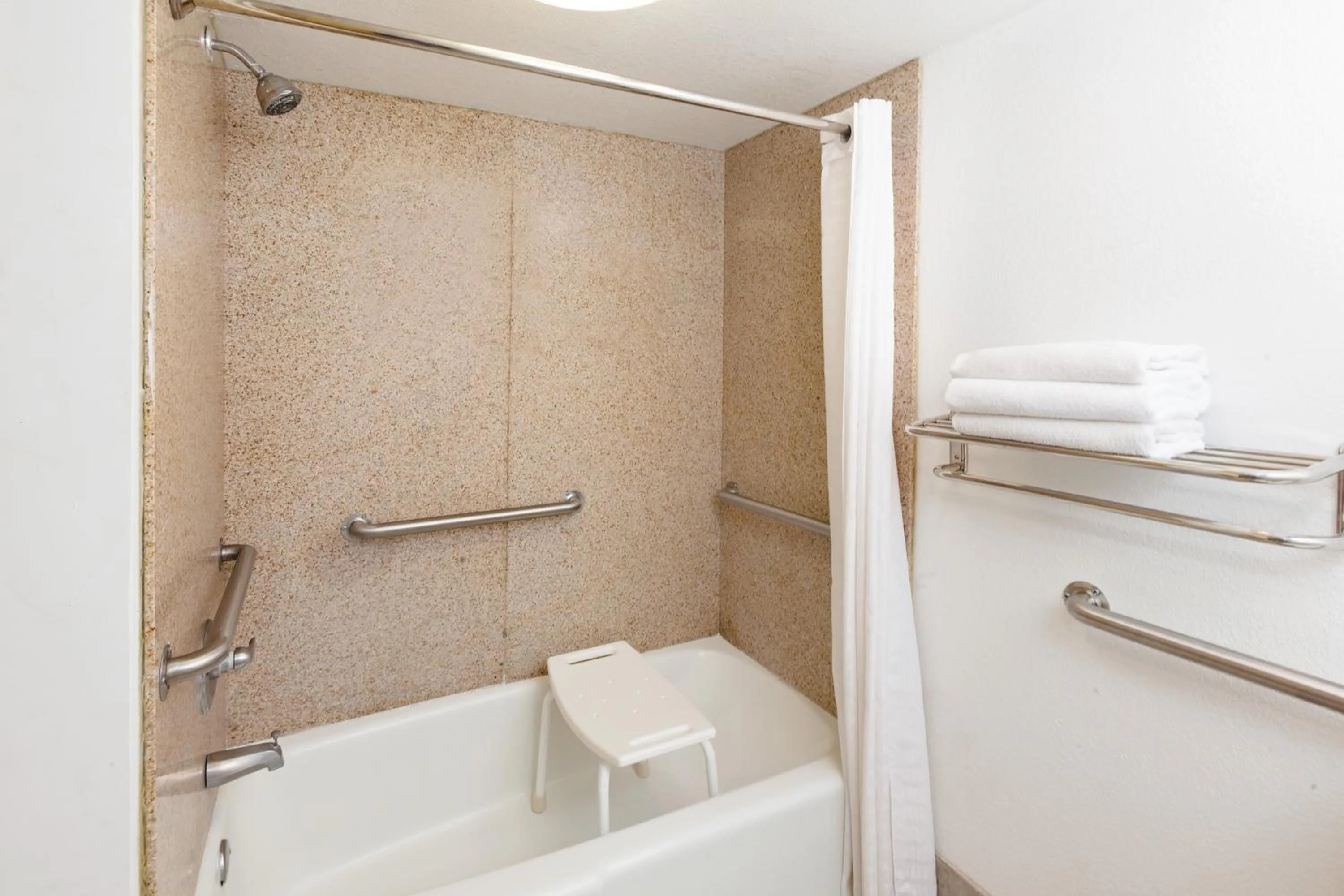 Bathroom in Super 8 by Wyndham Plainview