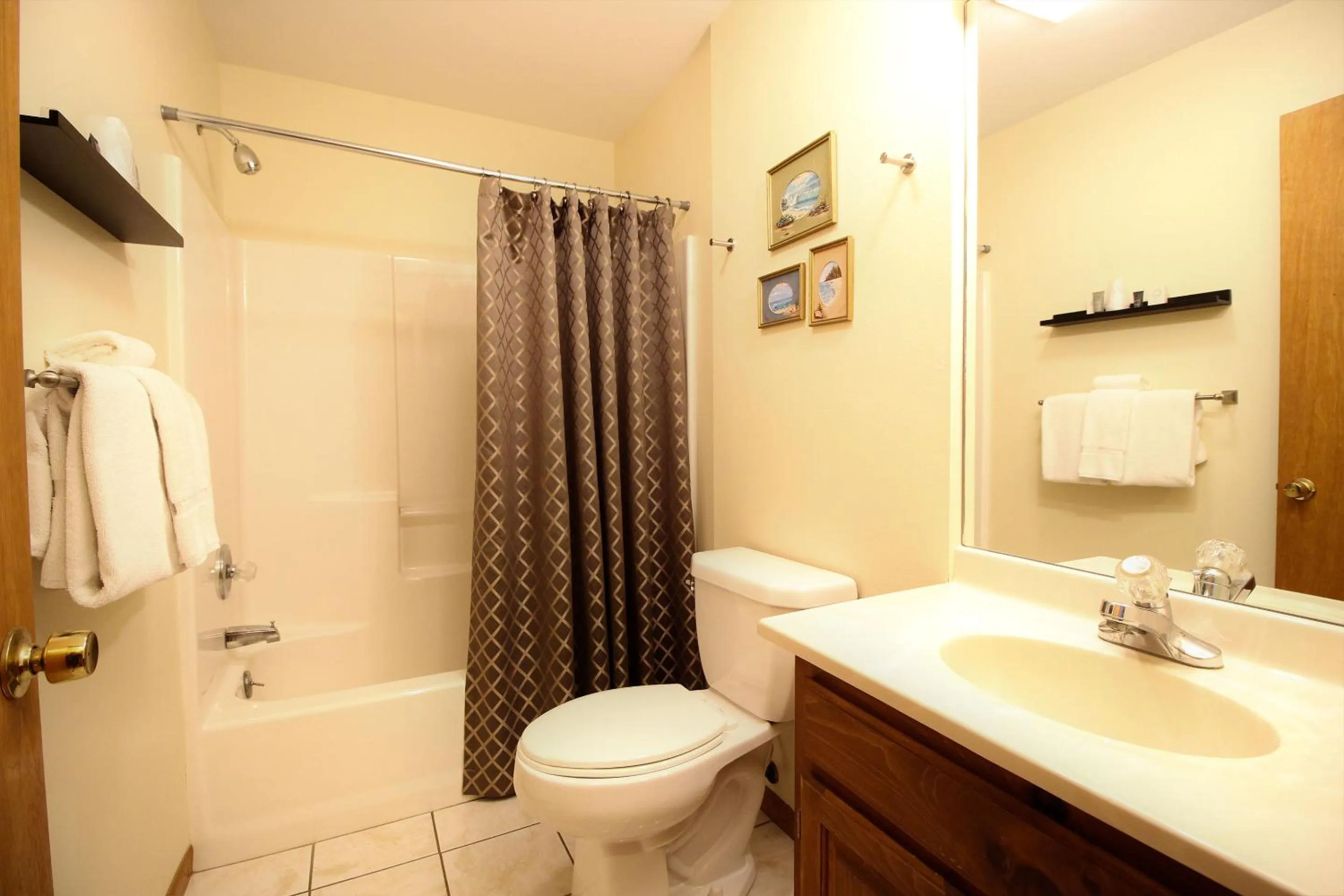 Bathroom in Peach Tree Inn & Suites