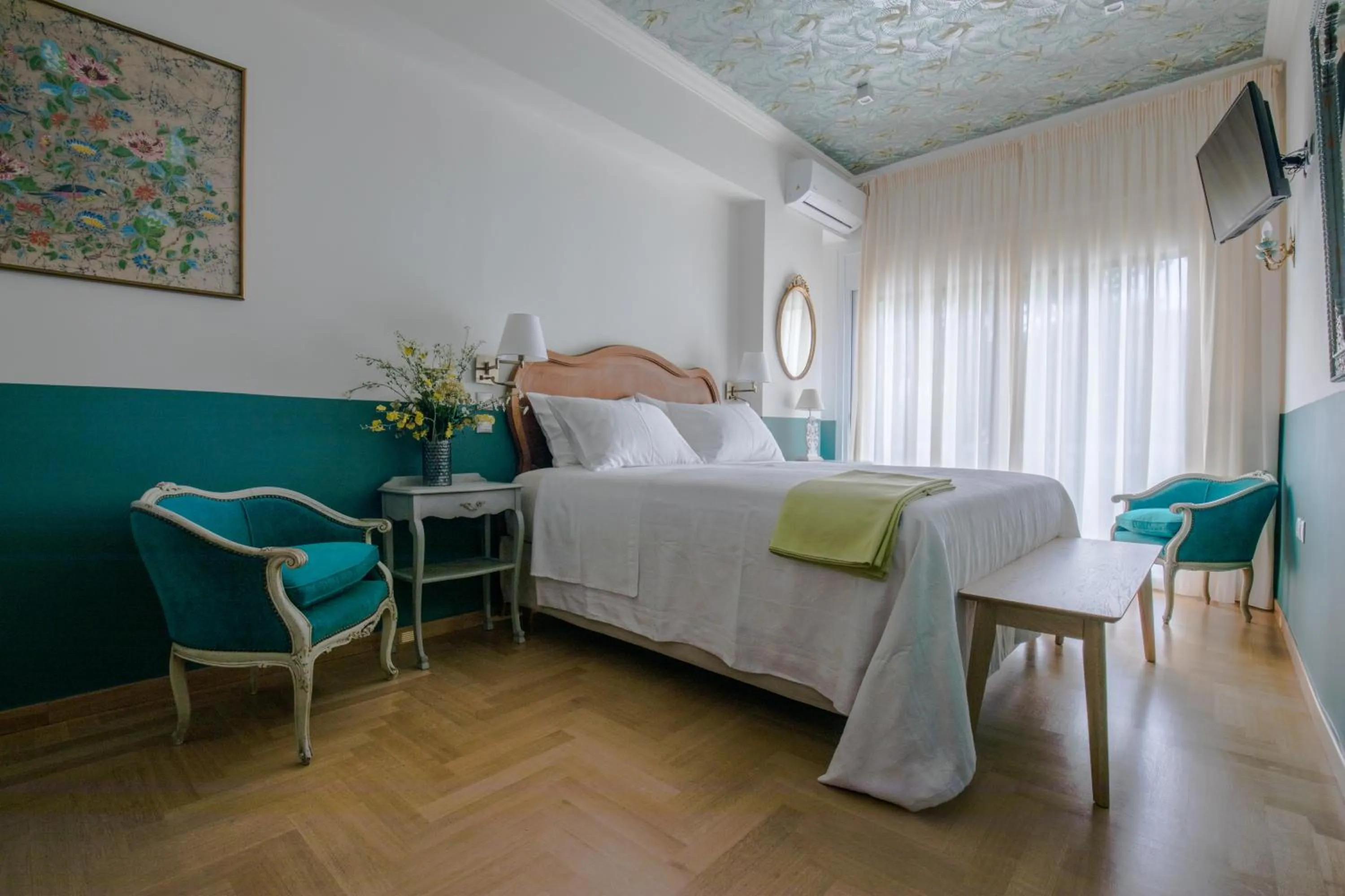 Bed in Rastoni Athens Suites near Acropolis at Tsatsou street