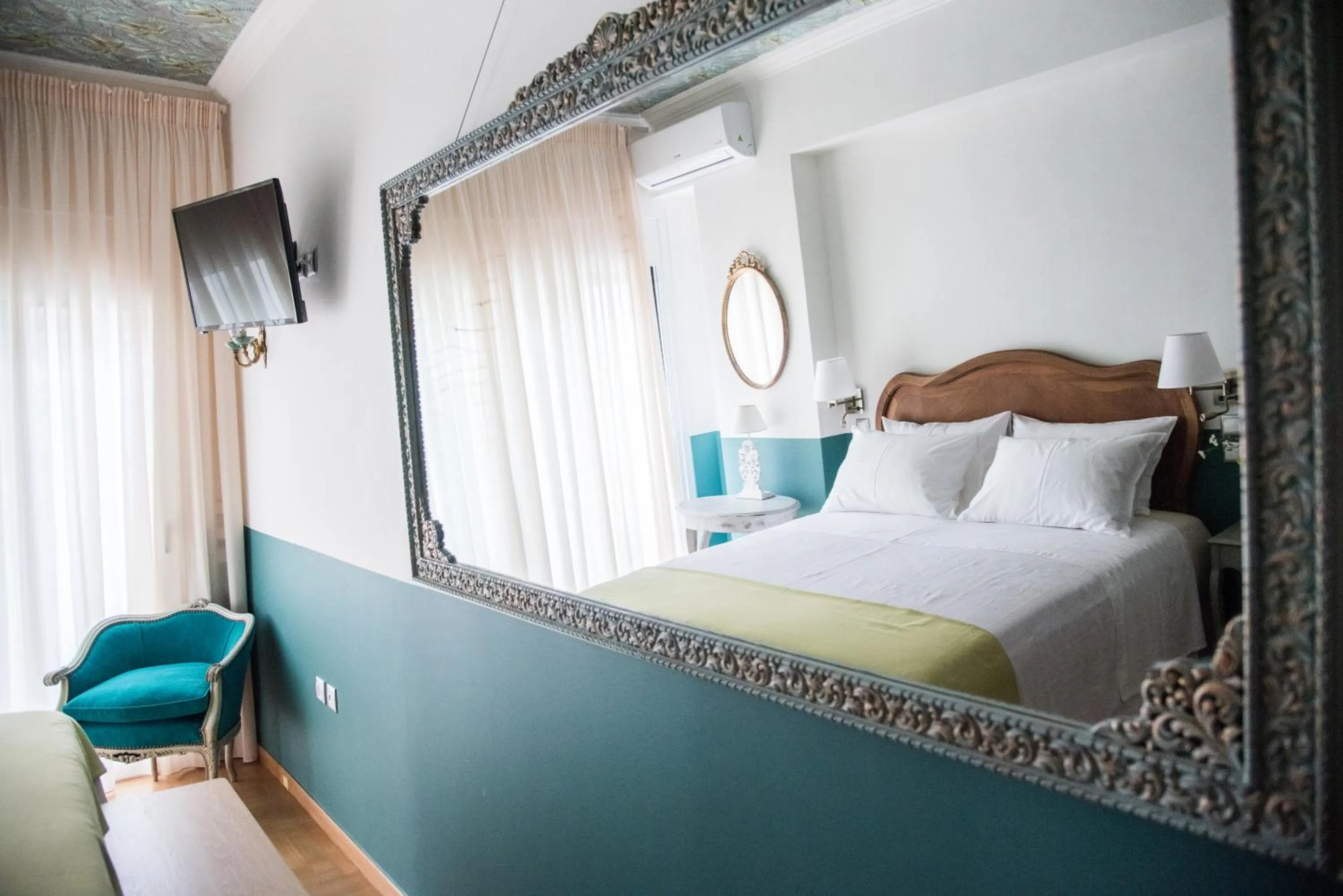 Bed in Rastoni Athens Suites near Acropolis at Tsatsou street