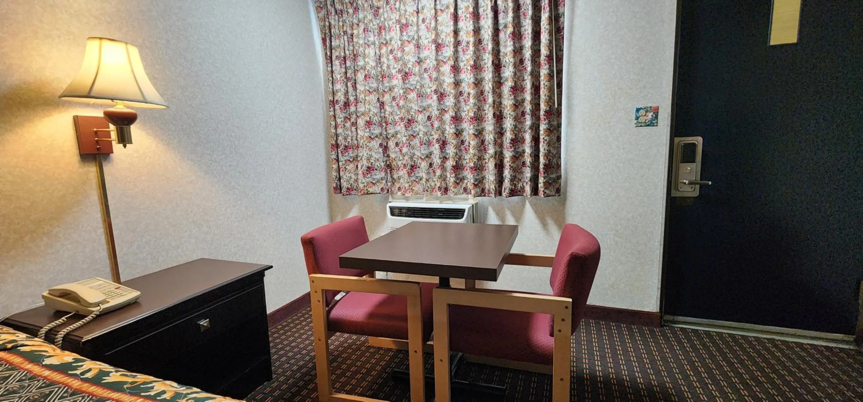 Bedroom in Turnpike Motel Richmond VA by Hotel O US 60