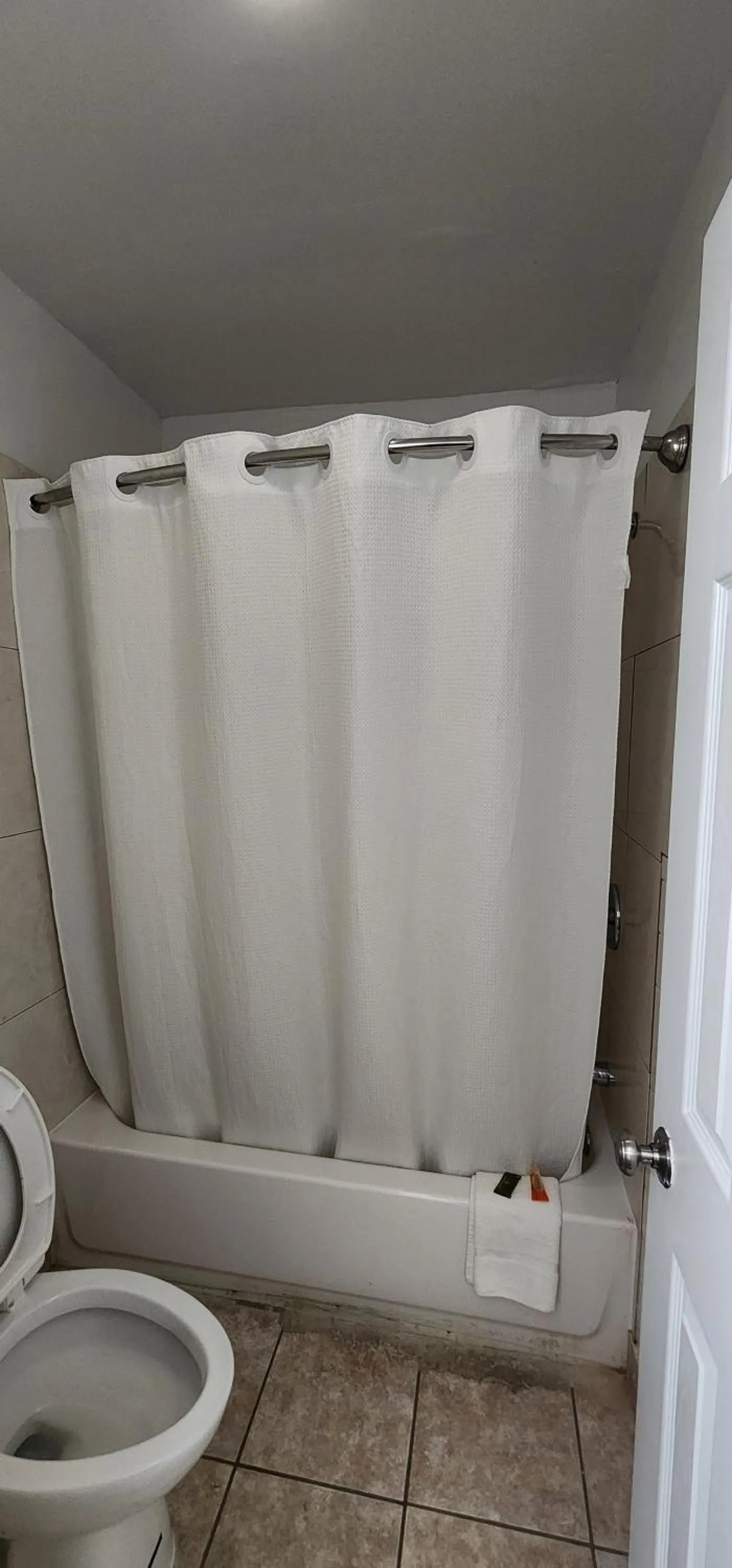 Bathroom in Turnpike Motel Richmond VA by Hotel O US 60