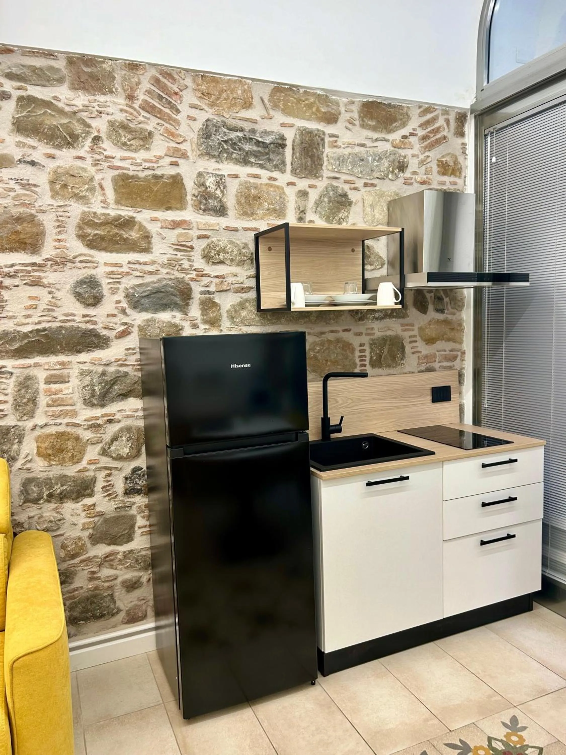 Kitchen or kitchenette in THE PALACE B&B and Apartments