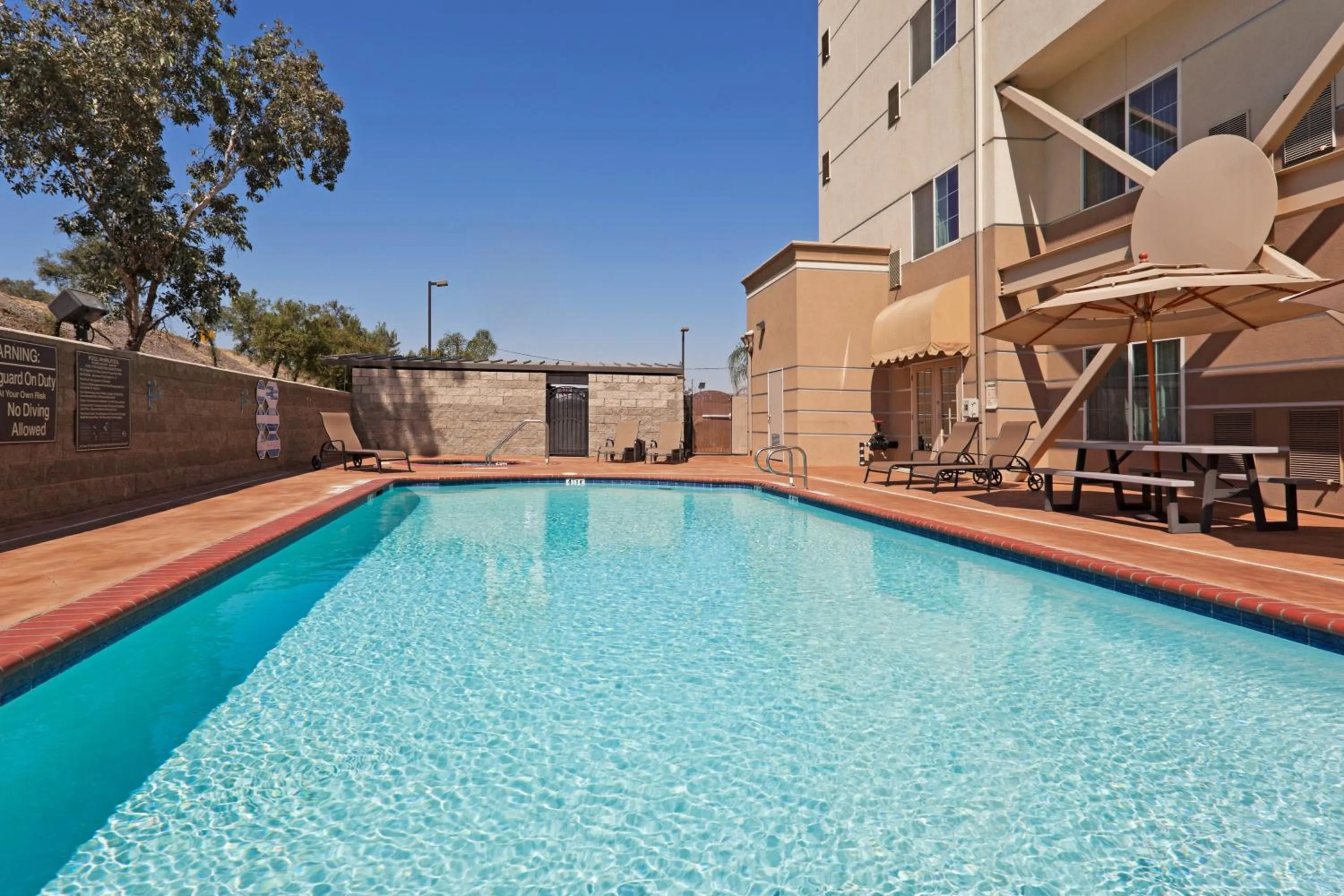 Swimming pool in Holiday Inn Express & Suites Bakersfield Central, an IHG Hotel