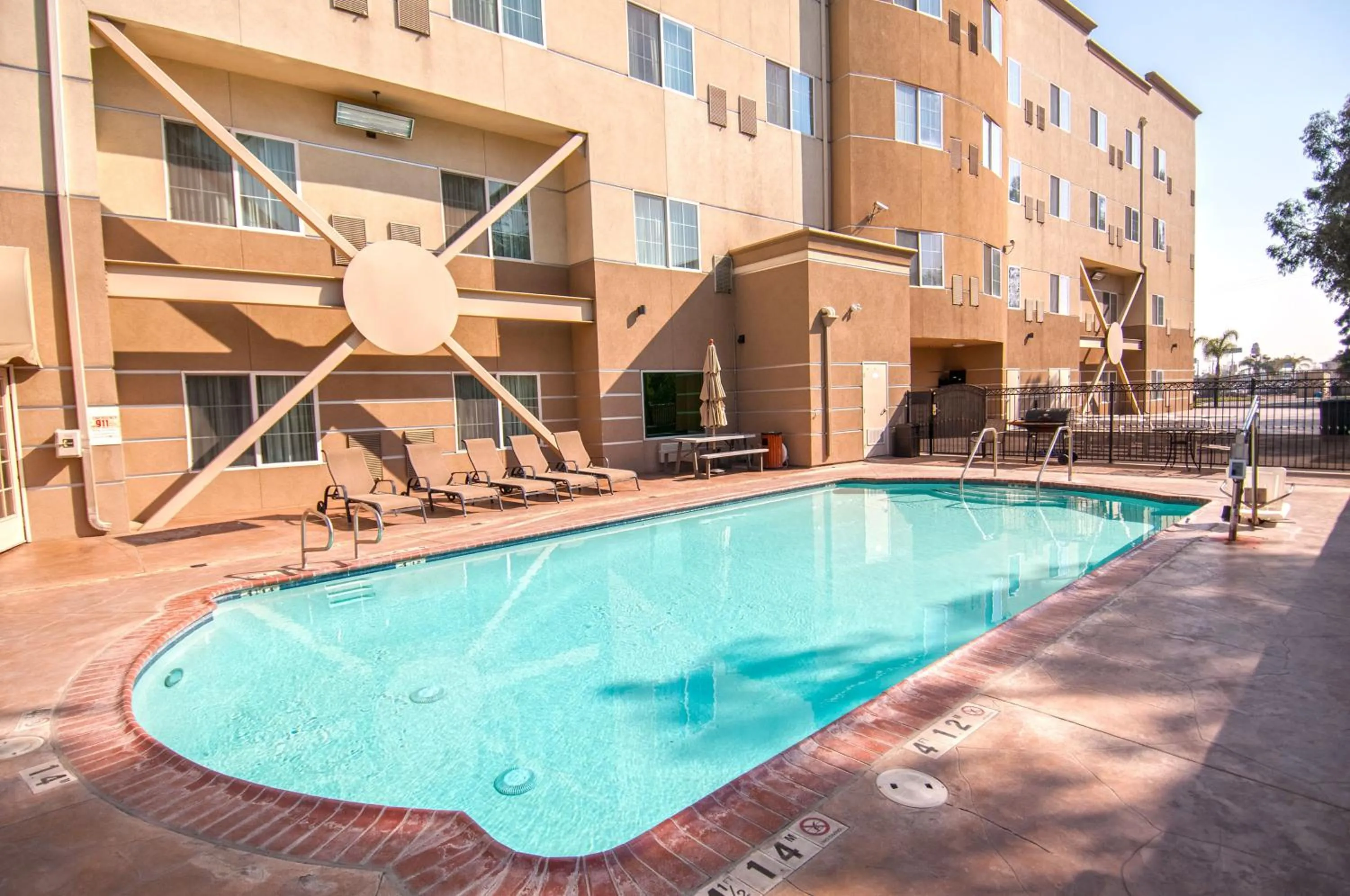 Swimming pool in Holiday Inn Express & Suites Bakersfield Central, an IHG Hotel