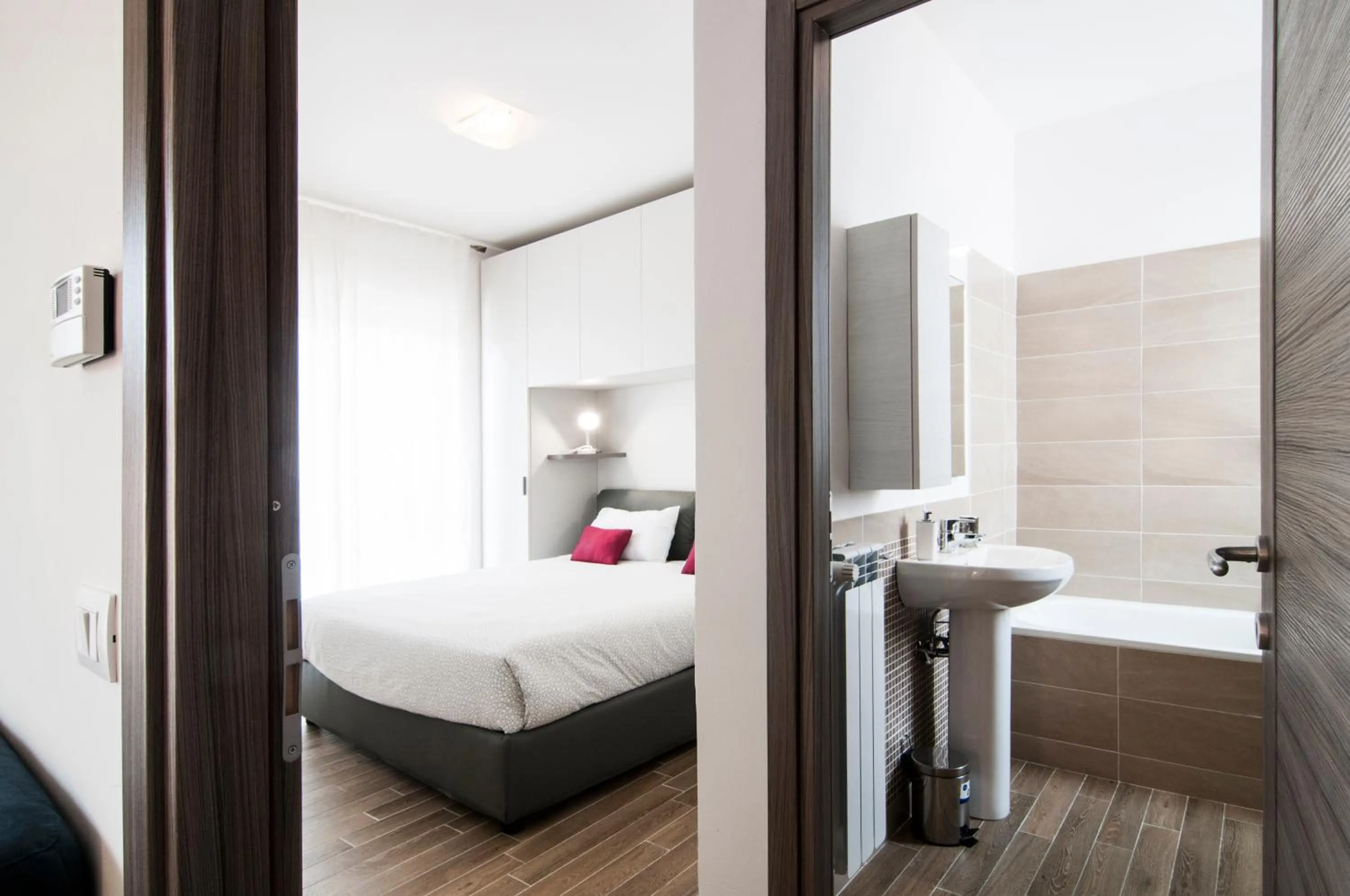 Bathroom, Bed in GuestHost - Fonte Laurentina Apartments