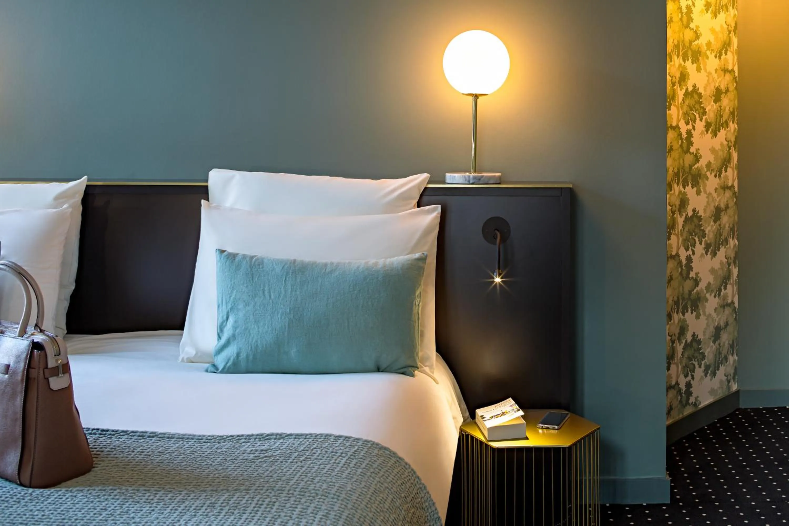 Decorative detail, Bed in Mercure Nantes Centre Passage Pommeraye