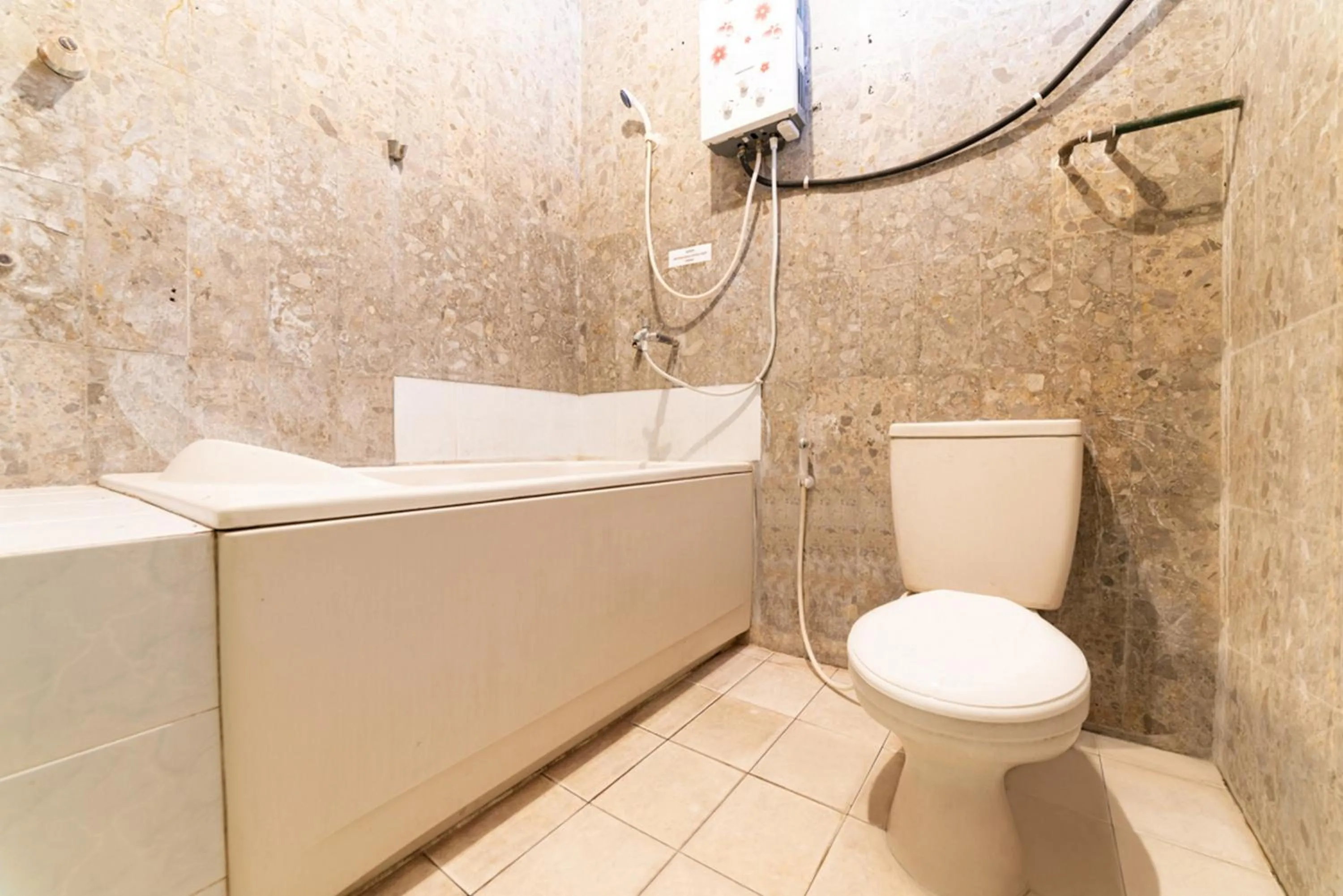 Bathroom in RedDoorz Syariah near Balai Kota Batu