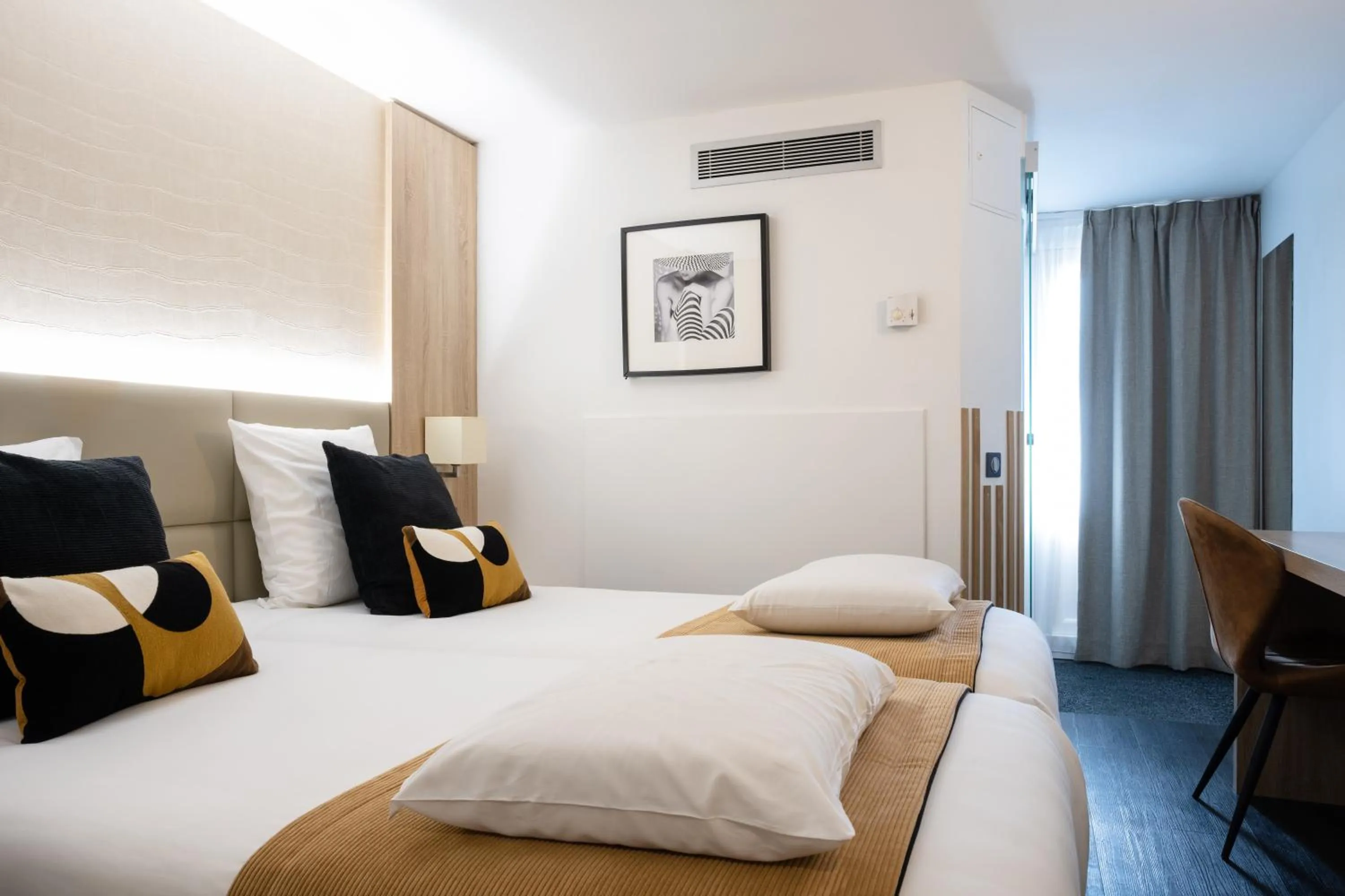 Photo of the whole room, Bed in Kyriad Beaune