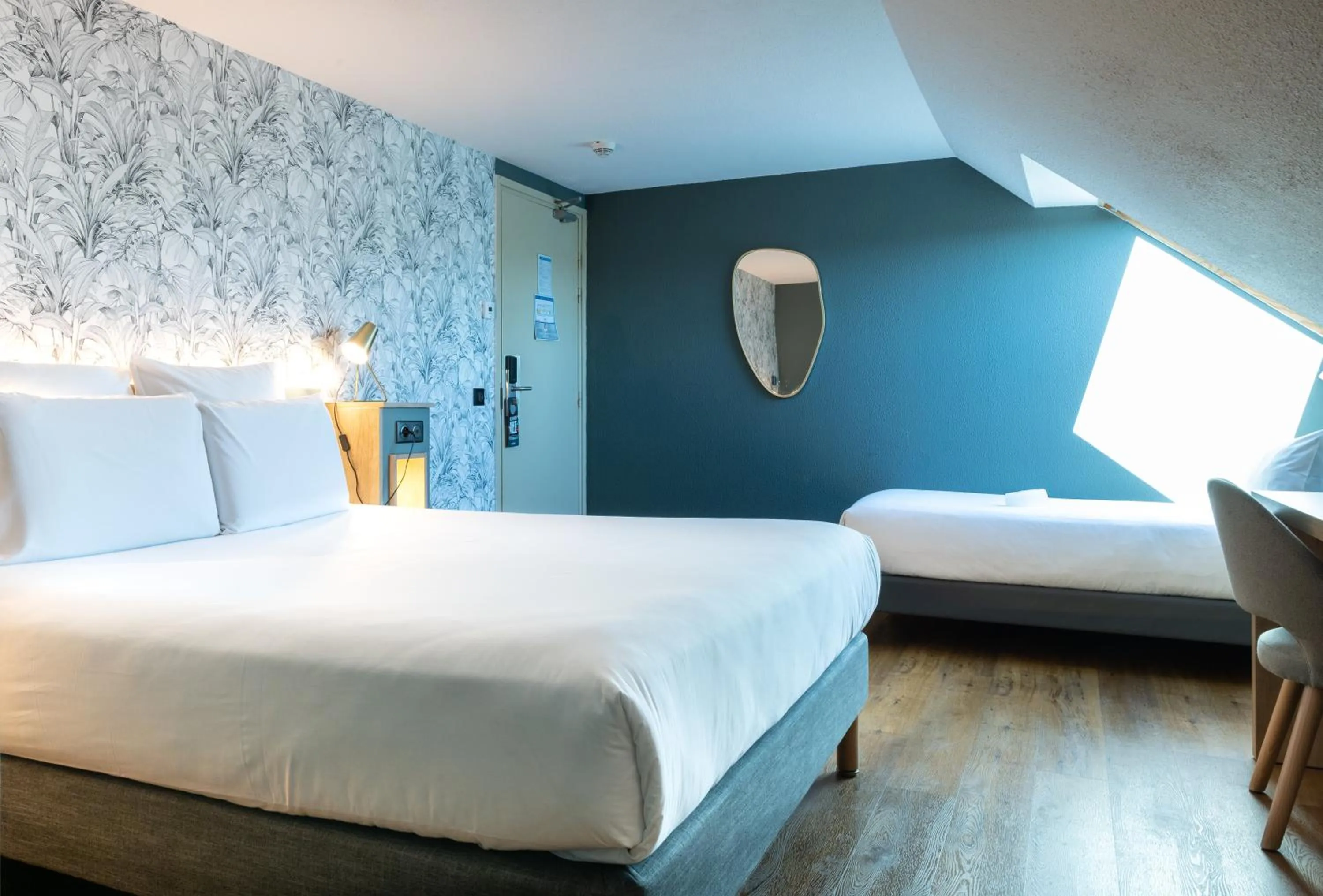 Photo of the whole room, Bed in Kyriad Beaune