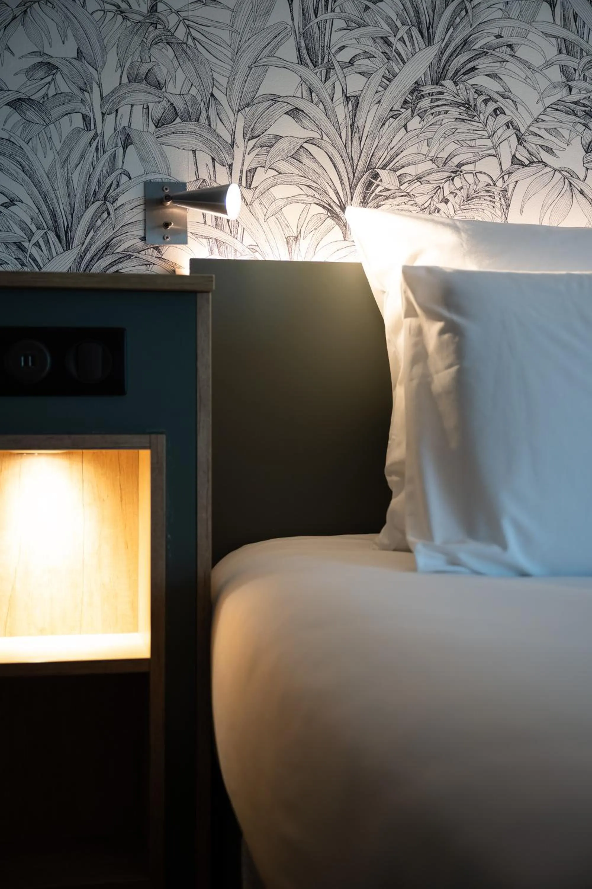 Decorative detail, Bed in Kyriad Beaune