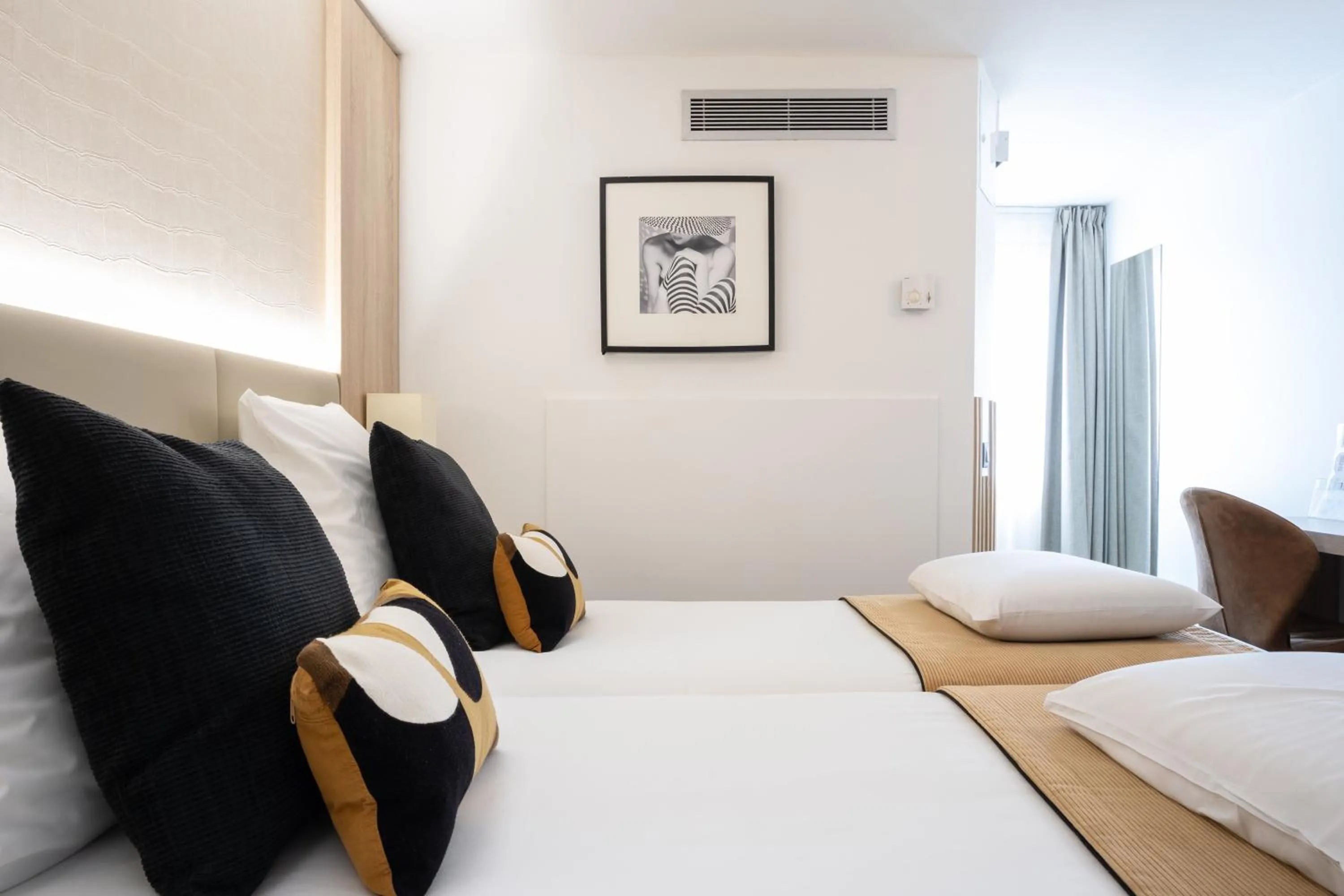 Photo of the whole room, Bed in Kyriad Beaune