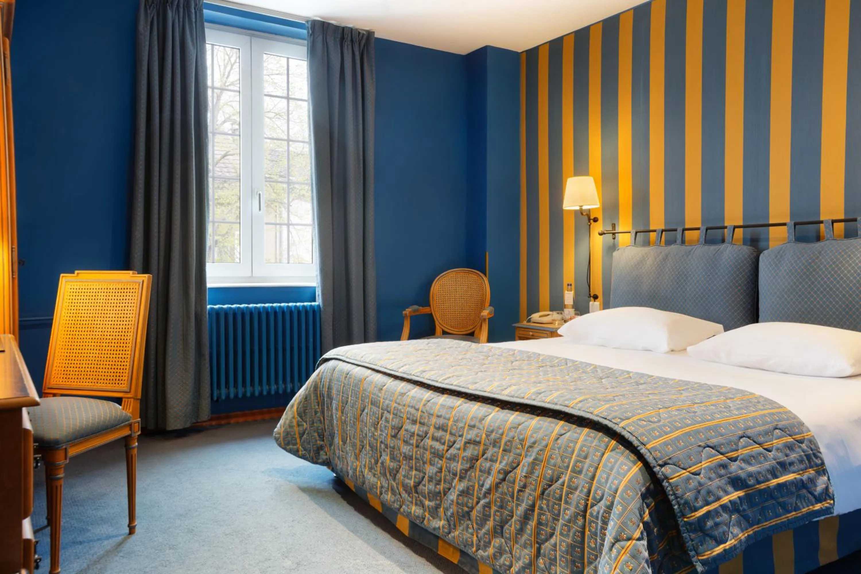 Bedroom, Bed in Logis Hôtel Beauséjour Colmar