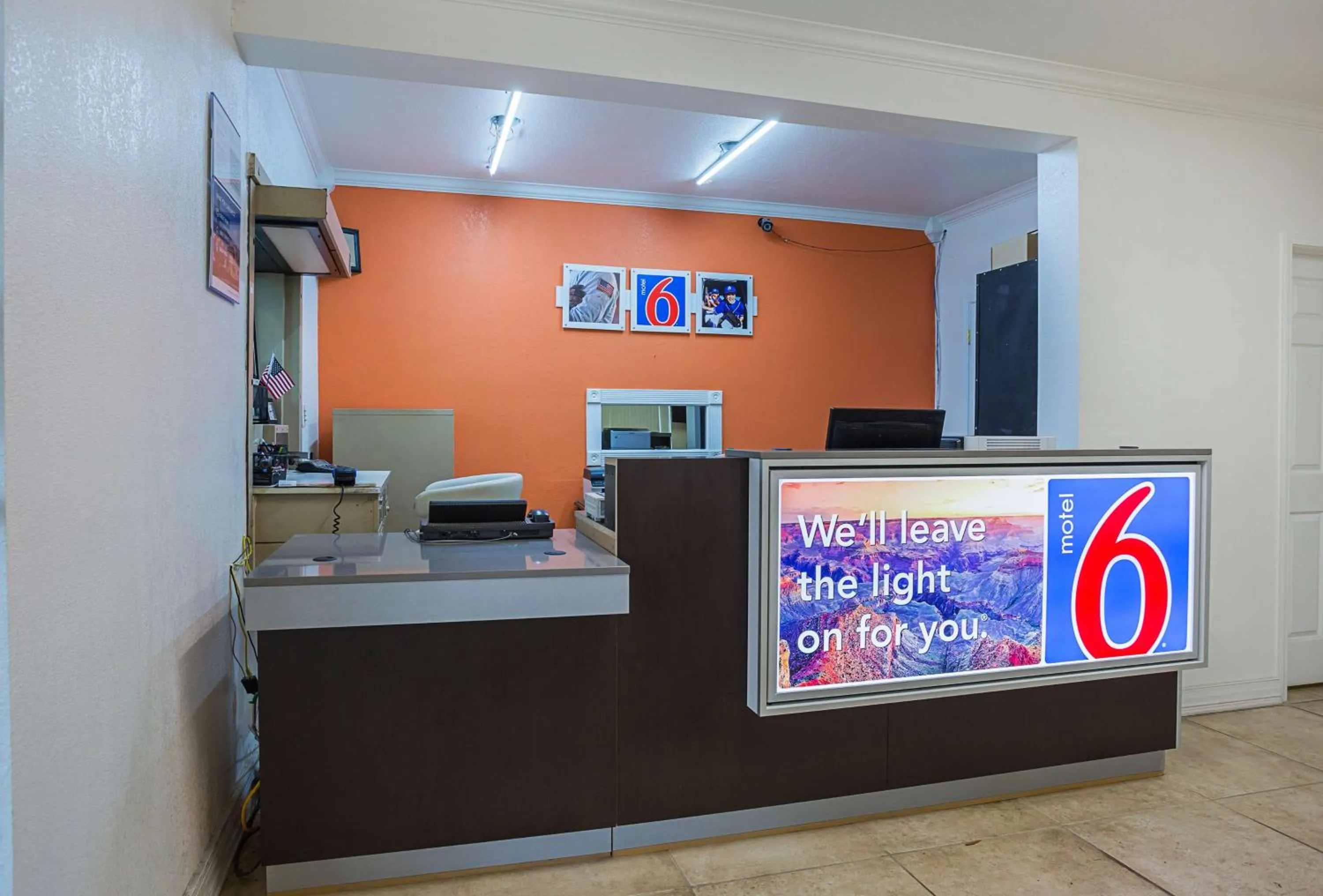 Property logo or sign in Motel 6-Brinkley, AR