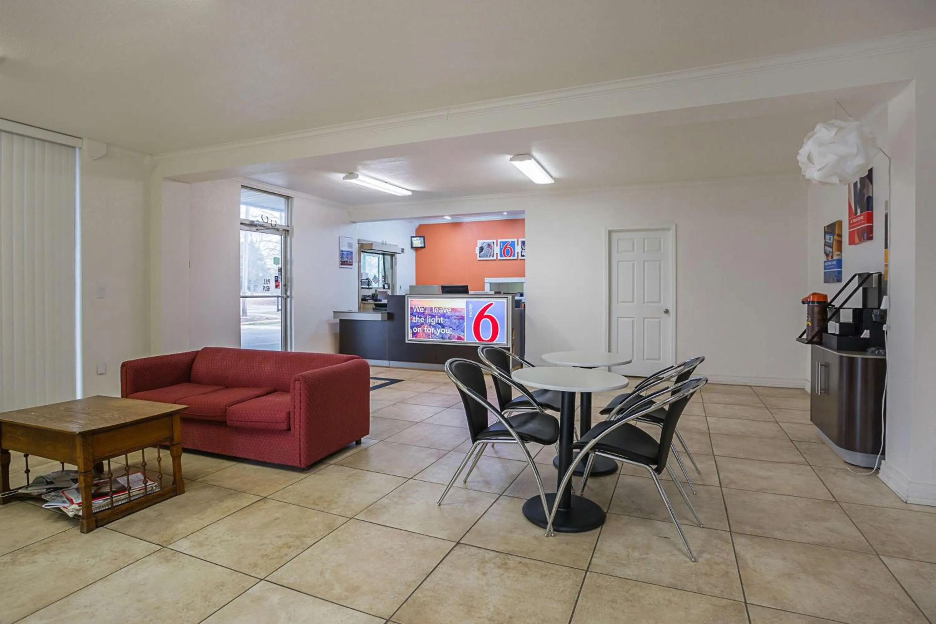 Property logo or sign in Motel 6-Brinkley, AR