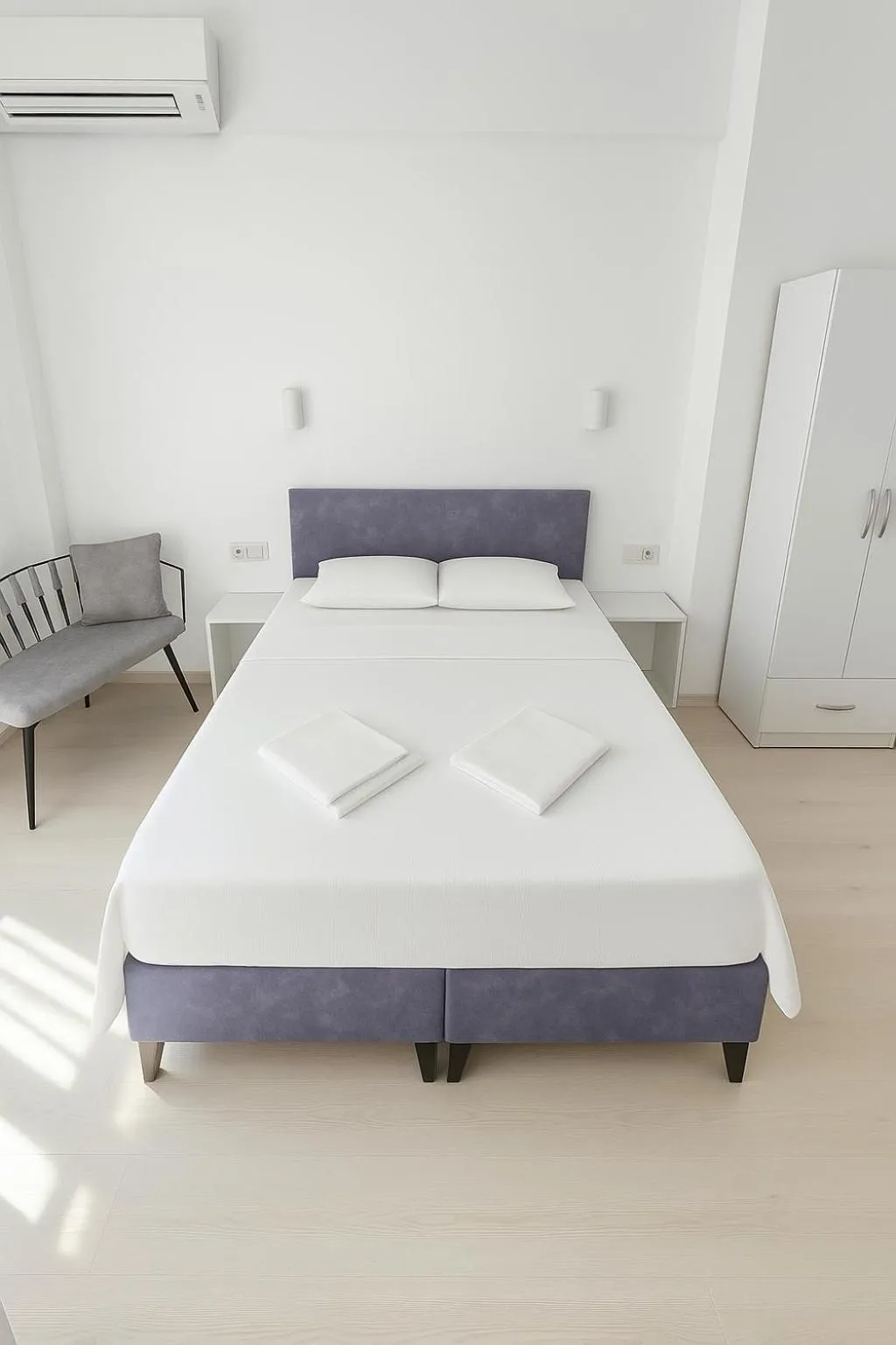 Bed in R HOUSE HOTEL