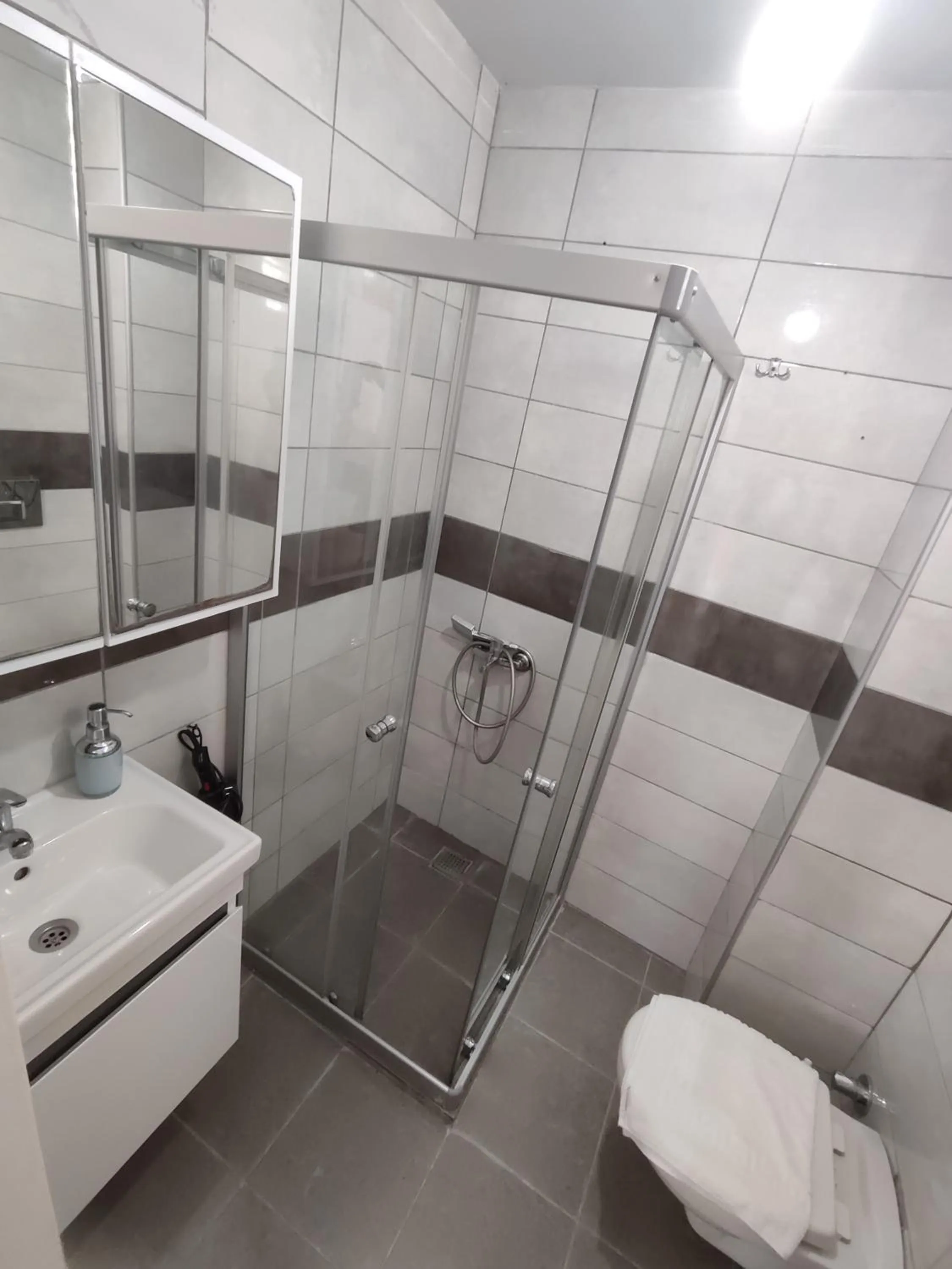 Shower in R HOUSE HOTEL