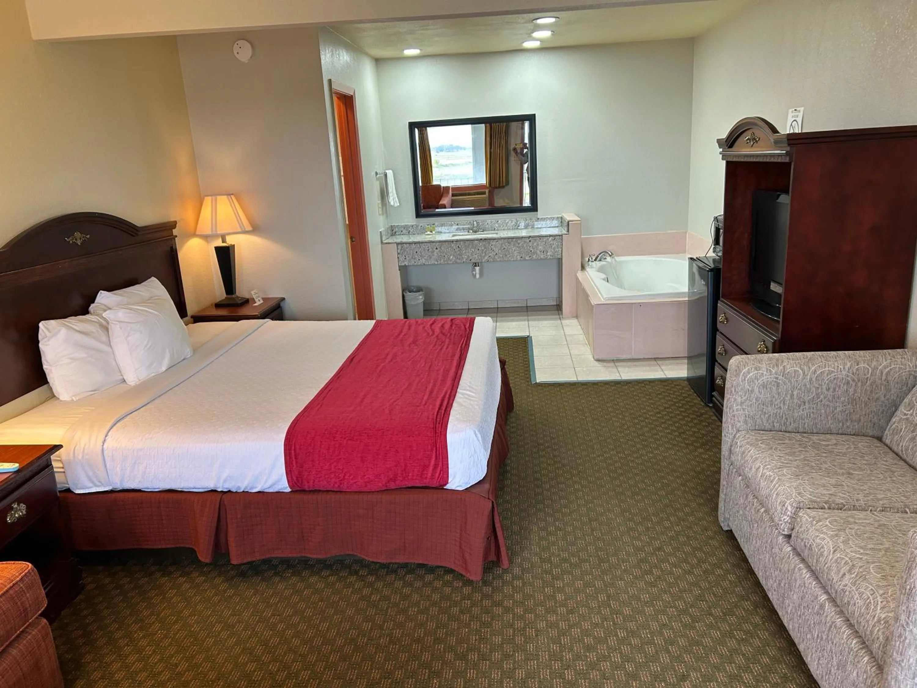 Bed in Howards Inn Motel