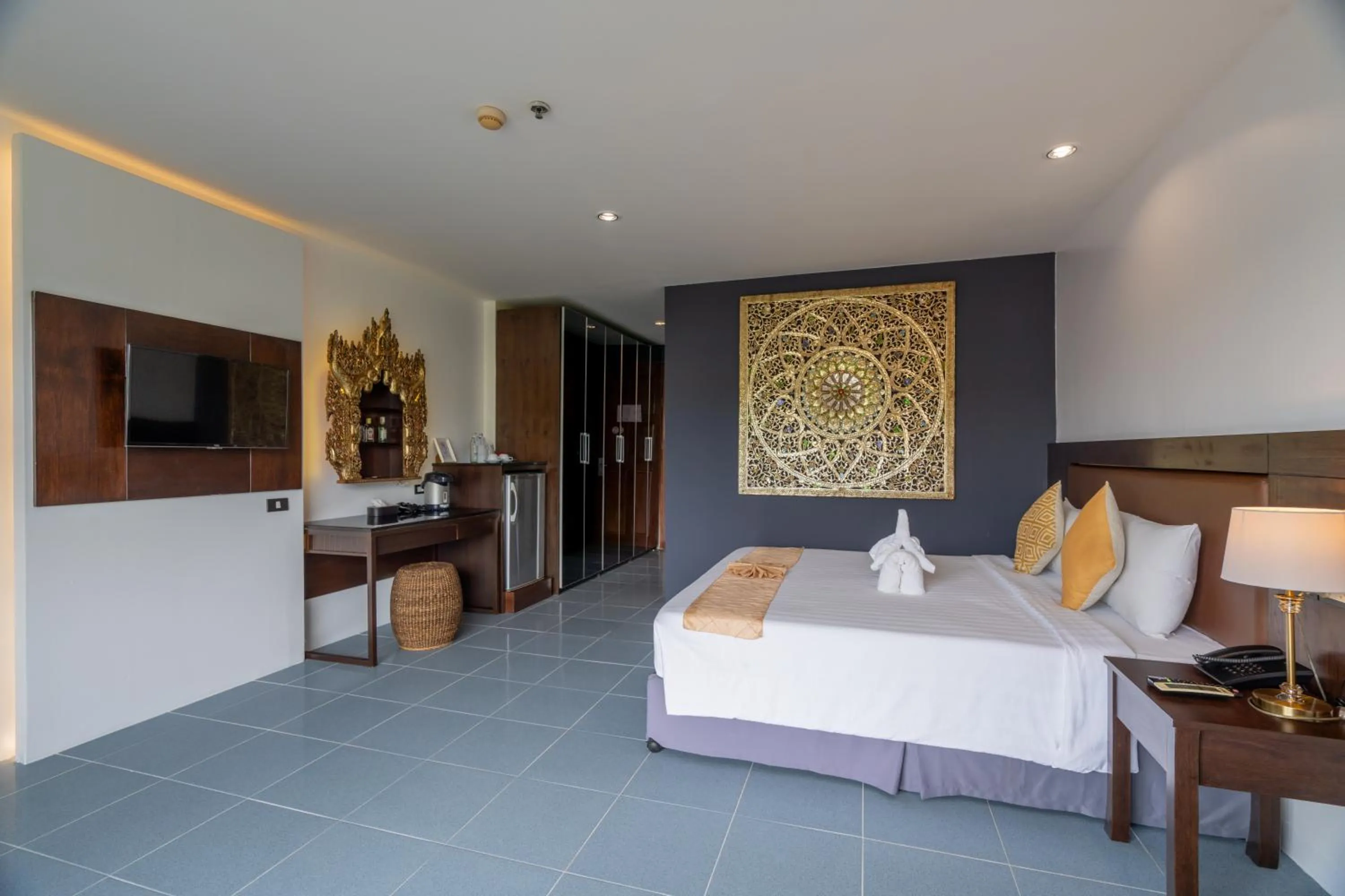 Bed in Blue Beach Grand Resort And Spa