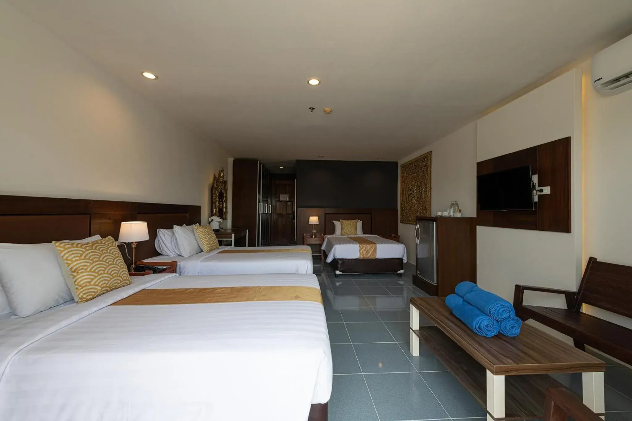 Deluxe Triple Room in Blue Beach Grand Resort And Spa Deluxe Triple Room in Blue Beach Grand Resort And Spa