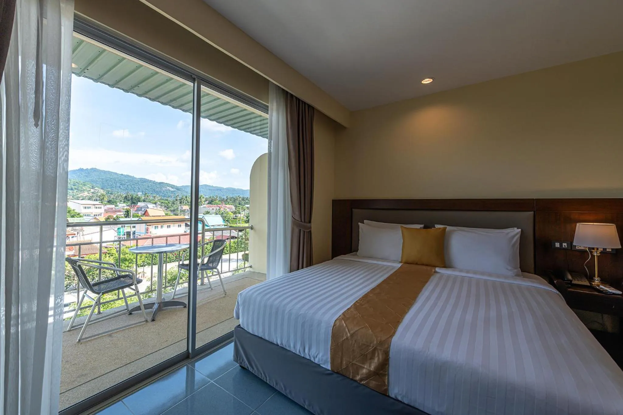 Mountain view, Bed in Blue Beach Grand Resort And Spa