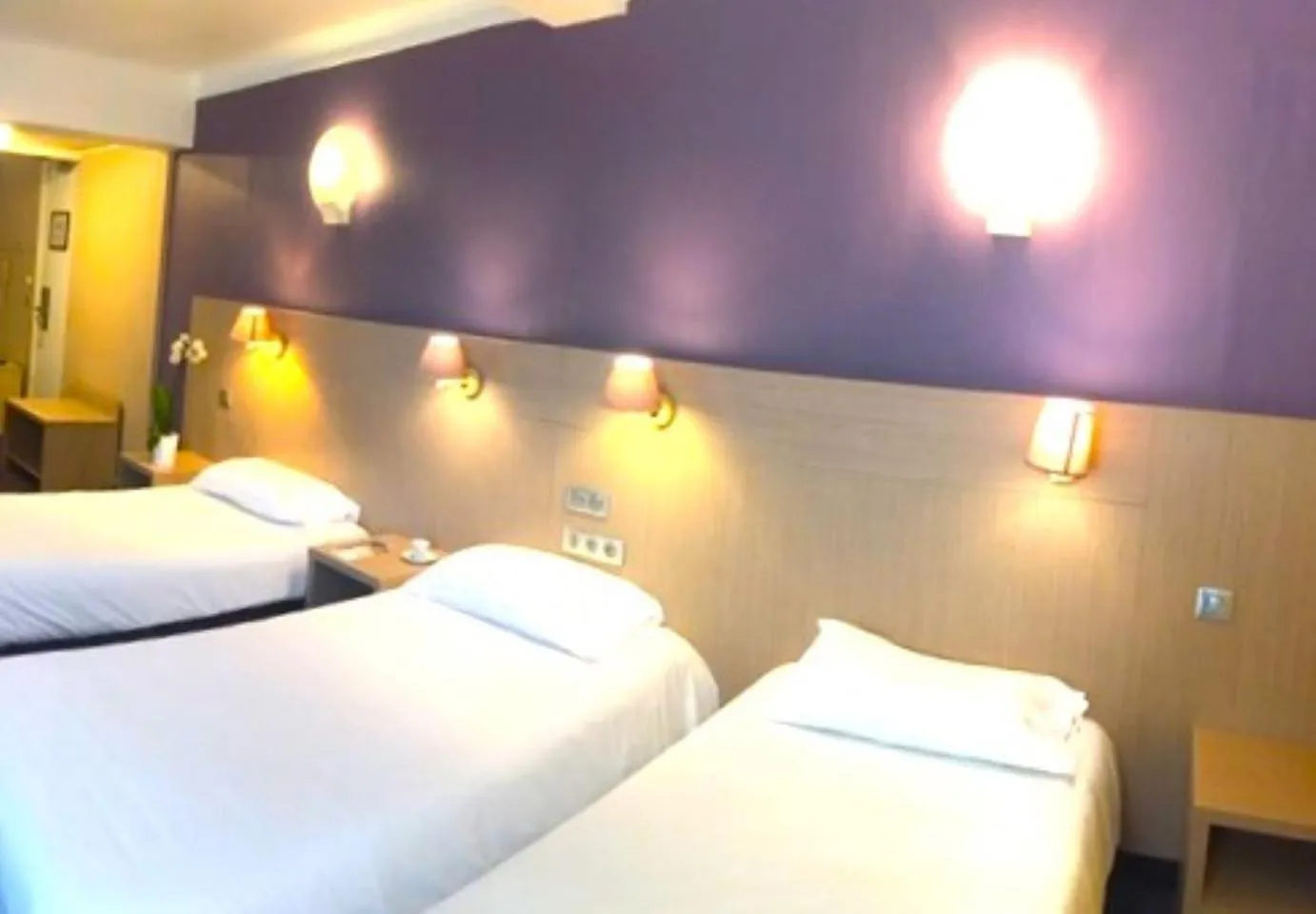 Bed in Hôtel Christina Lourdes